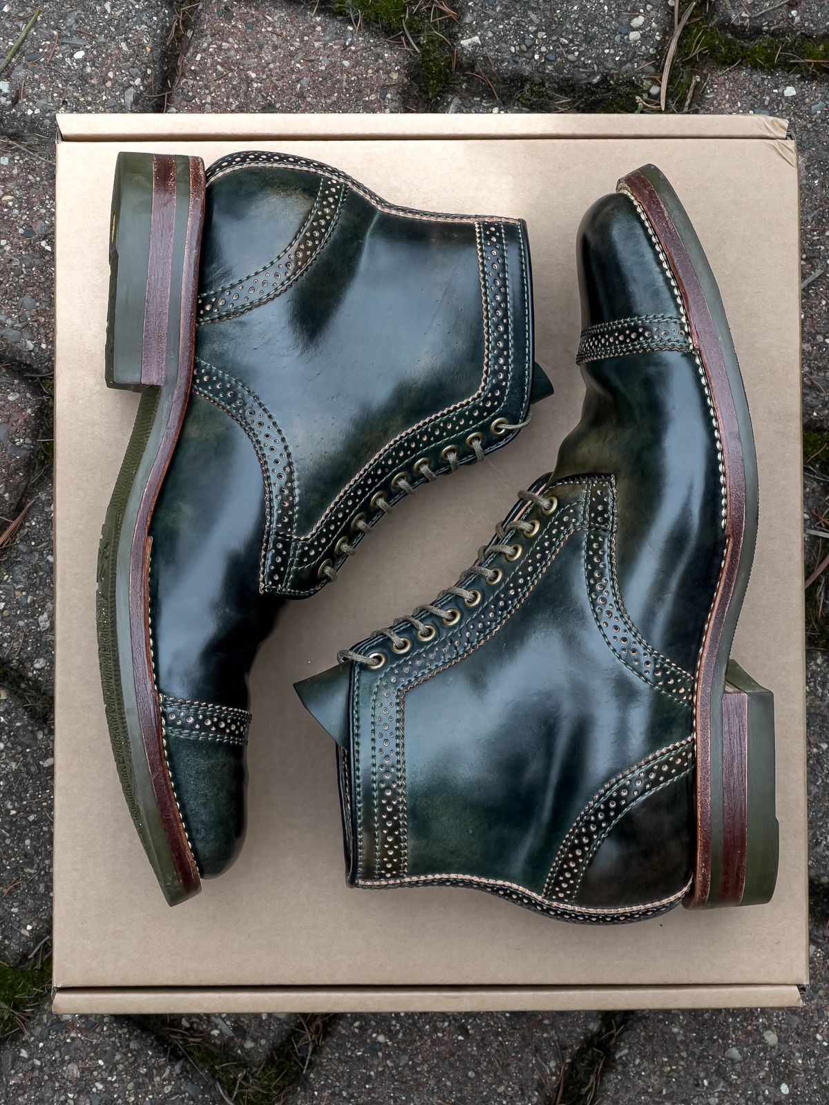 Photo by weathered.hide on March 5, 2023 of the Flame Panda Brogue Cap Toe Service Boot in Horween Marbled Black Shell Cordovan.