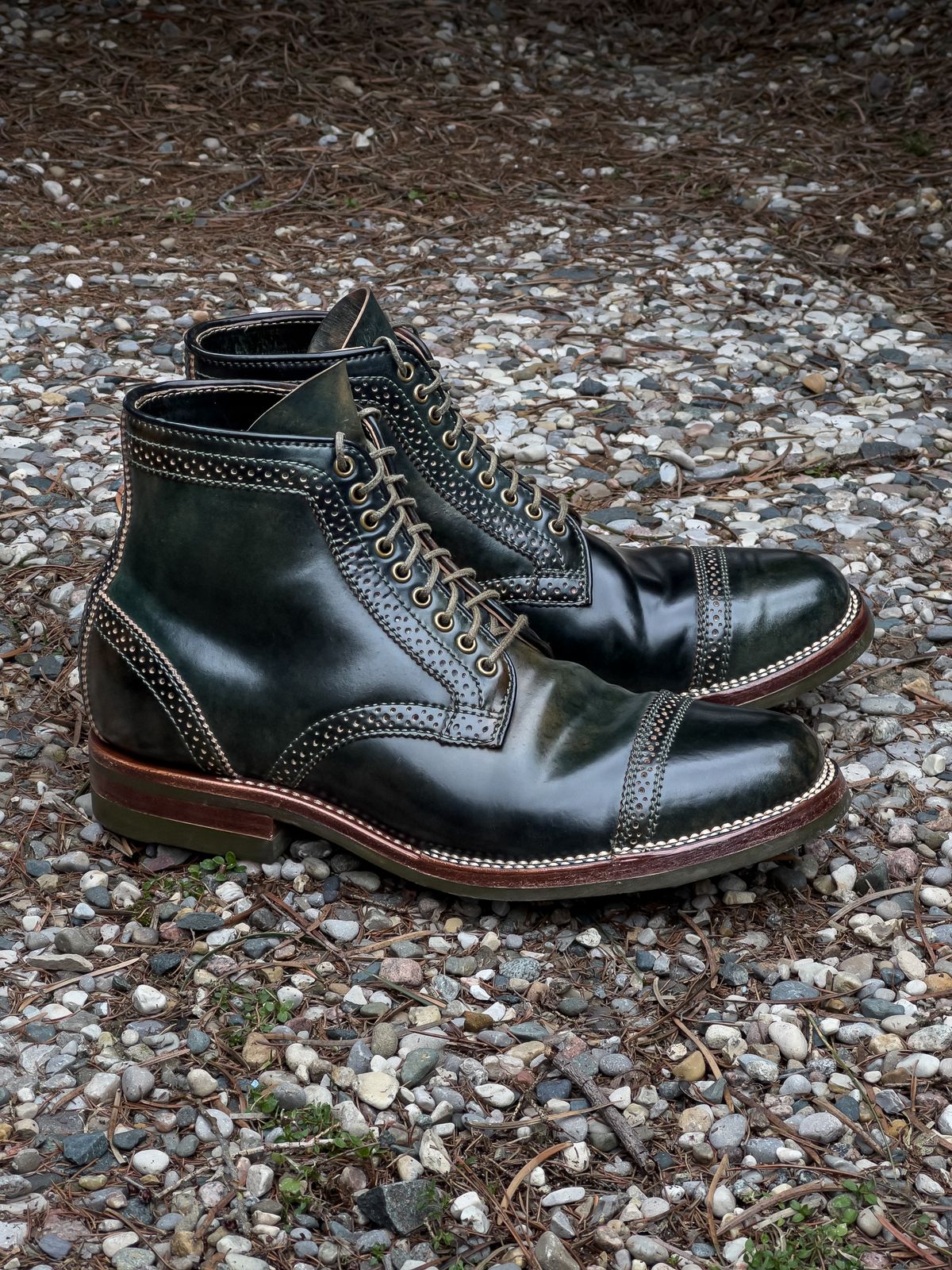 Photo by weathered.hide on March 5, 2023 of the Flame Panda Brogue Cap Toe Service Boot in Horween Marbled Black Shell Cordovan.