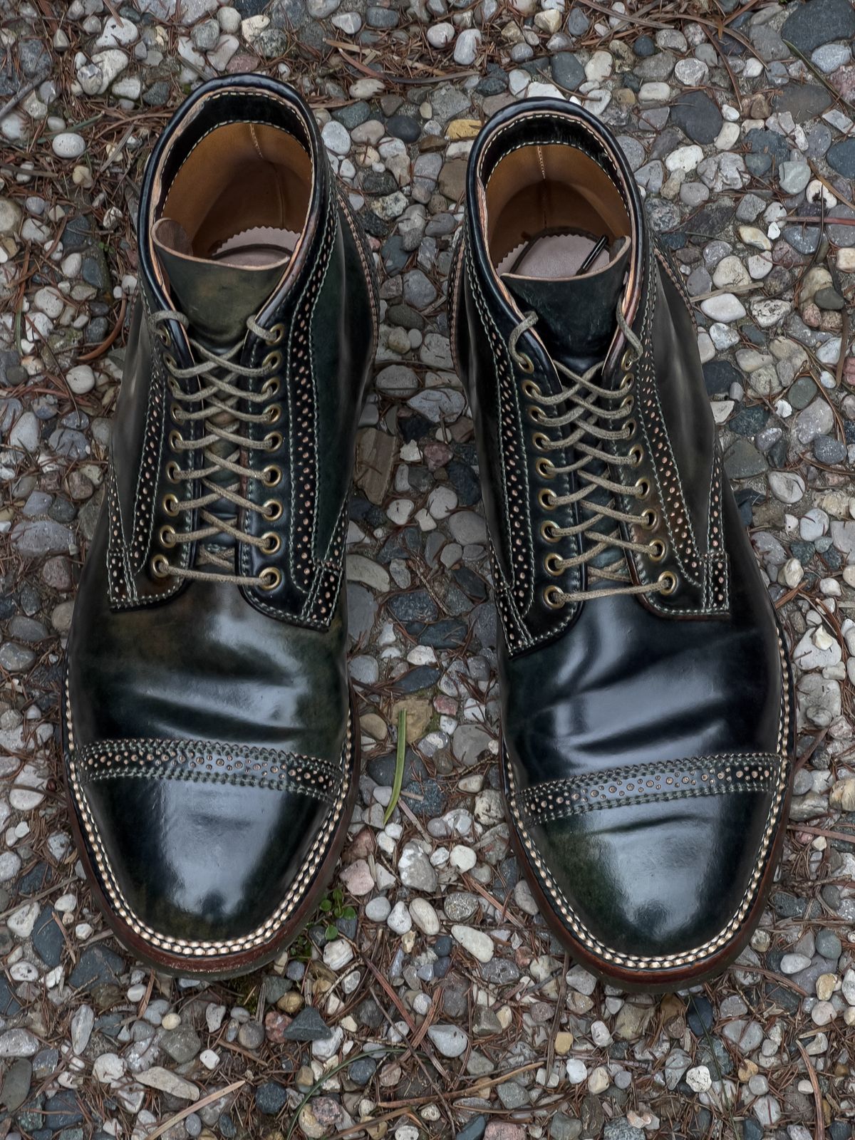 Photo by weathered.hide on March 5, 2023 of the Flame Panda Brogue Cap Toe Service Boot in Horween Marbled Black Shell Cordovan.