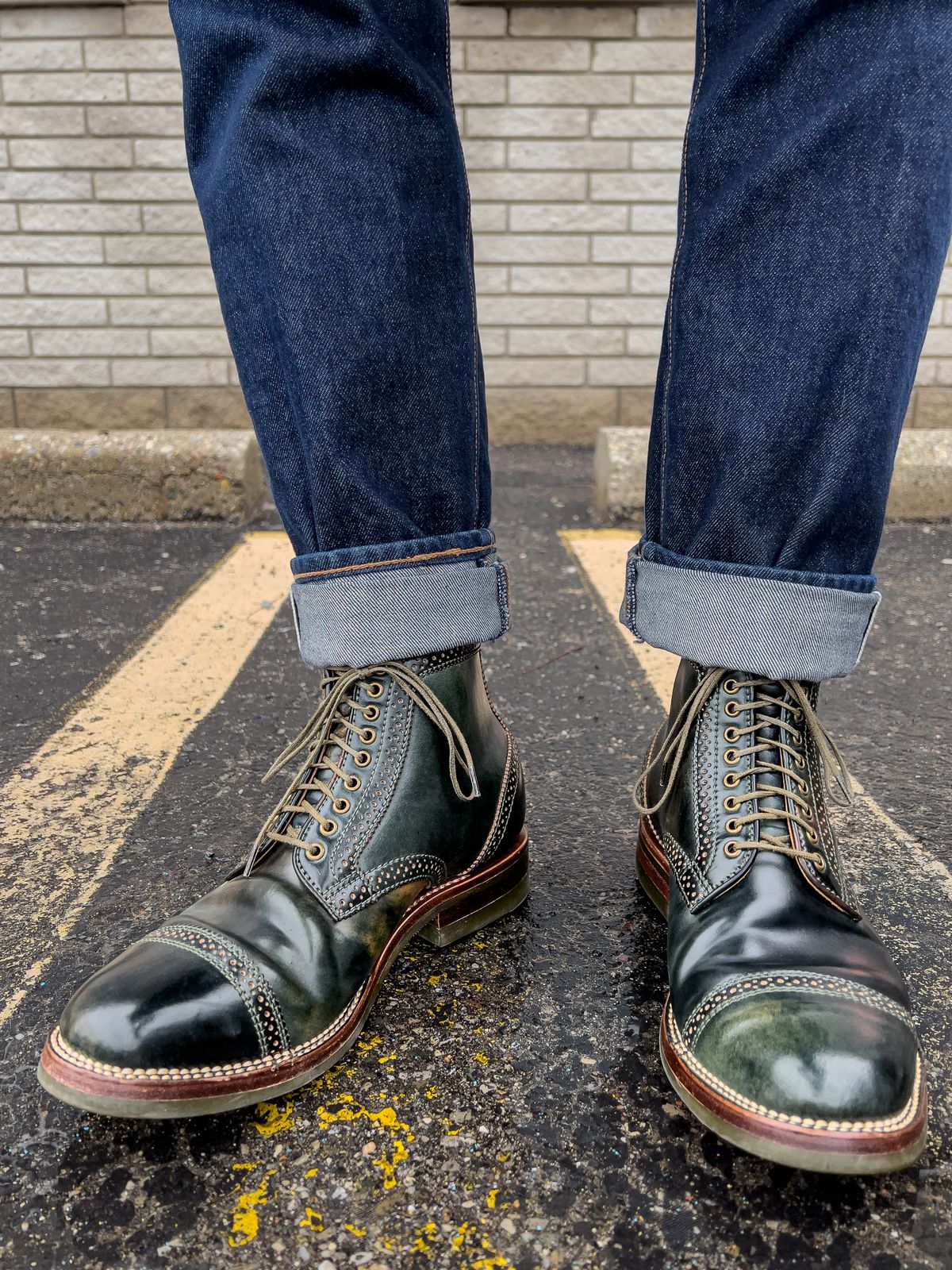 Photo by weathered.hide on April 5, 2023 of the Flame Panda Brogue Cap Toe Service Boot in Horween Marbled Black Shell Cordovan.