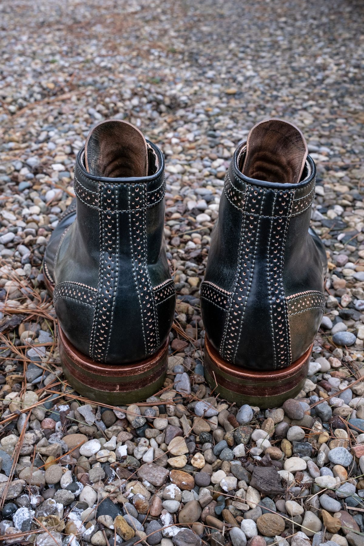 Photo by weathered.hide on April 5, 2023 of the Flame Panda Brogue Cap Toe Service Boot in Horween Marbled Black Shell Cordovan.