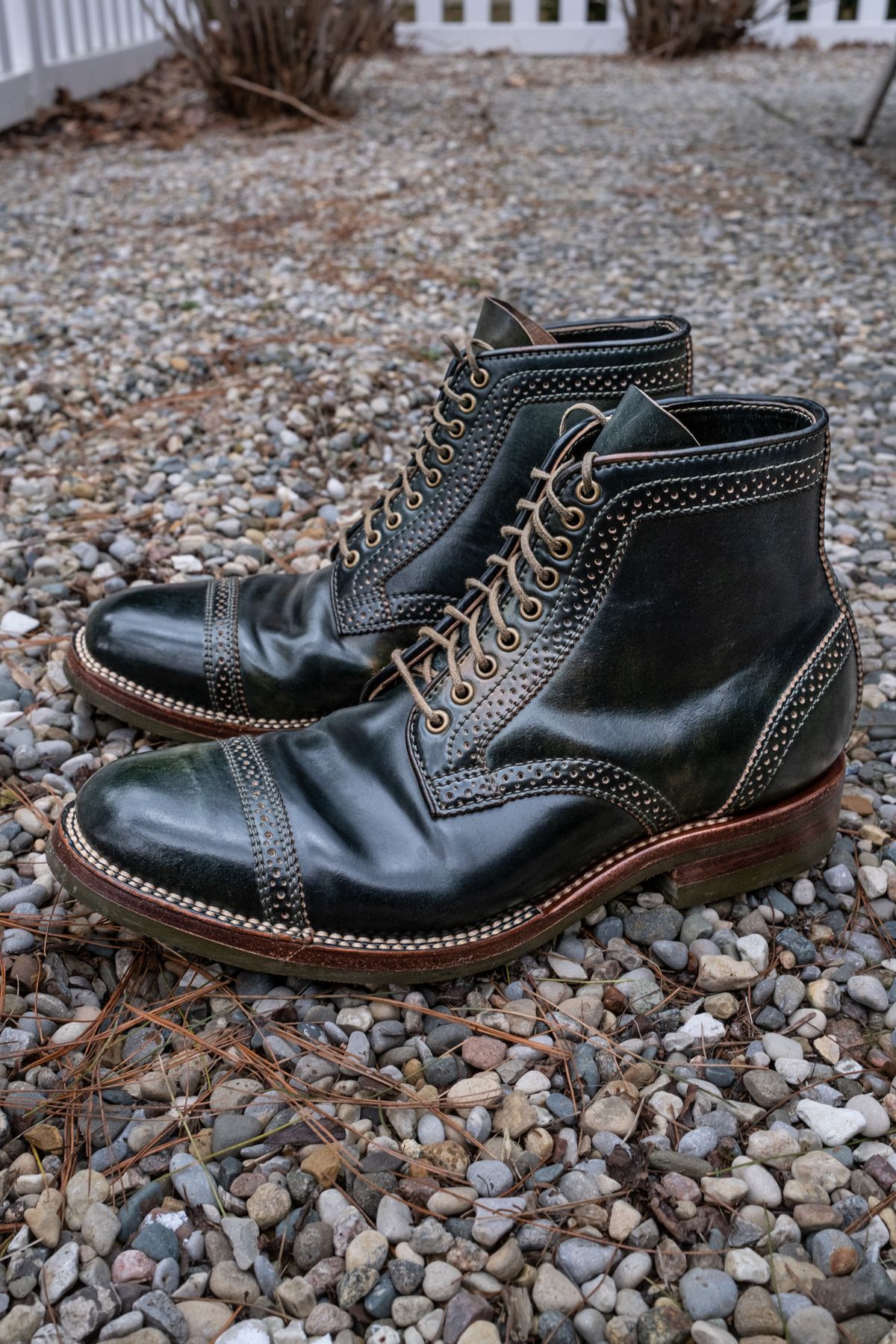 Photo by weathered.hide on April 5, 2023 of the Flame Panda Brogue Cap Toe Service Boot in Horween Marbled Black Shell Cordovan.