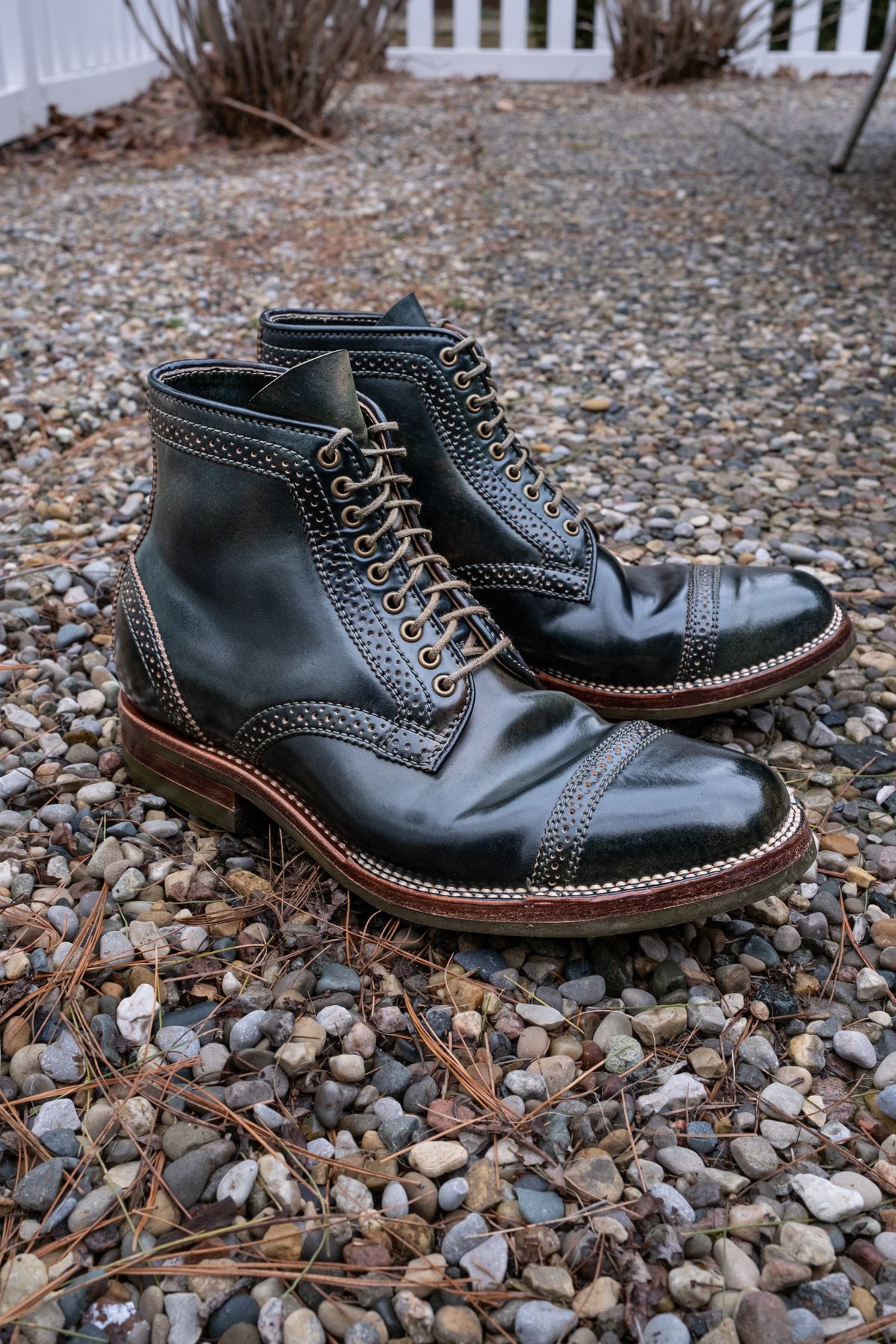 Photo by weathered.hide on April 5, 2023 of the Flame Panda Brogue Cap Toe Service Boot in Horween Marbled Black Shell Cordovan.