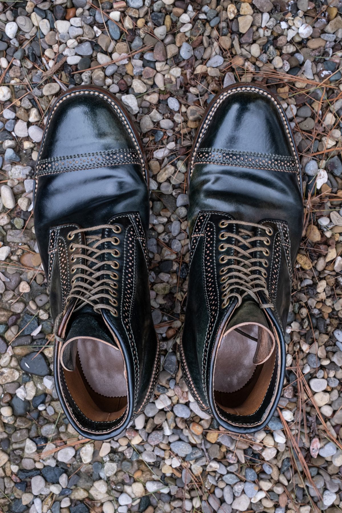 Photo by weathered.hide on April 5, 2023 of the Flame Panda Brogue Cap Toe Service Boot in Horween Marbled Black Shell Cordovan.