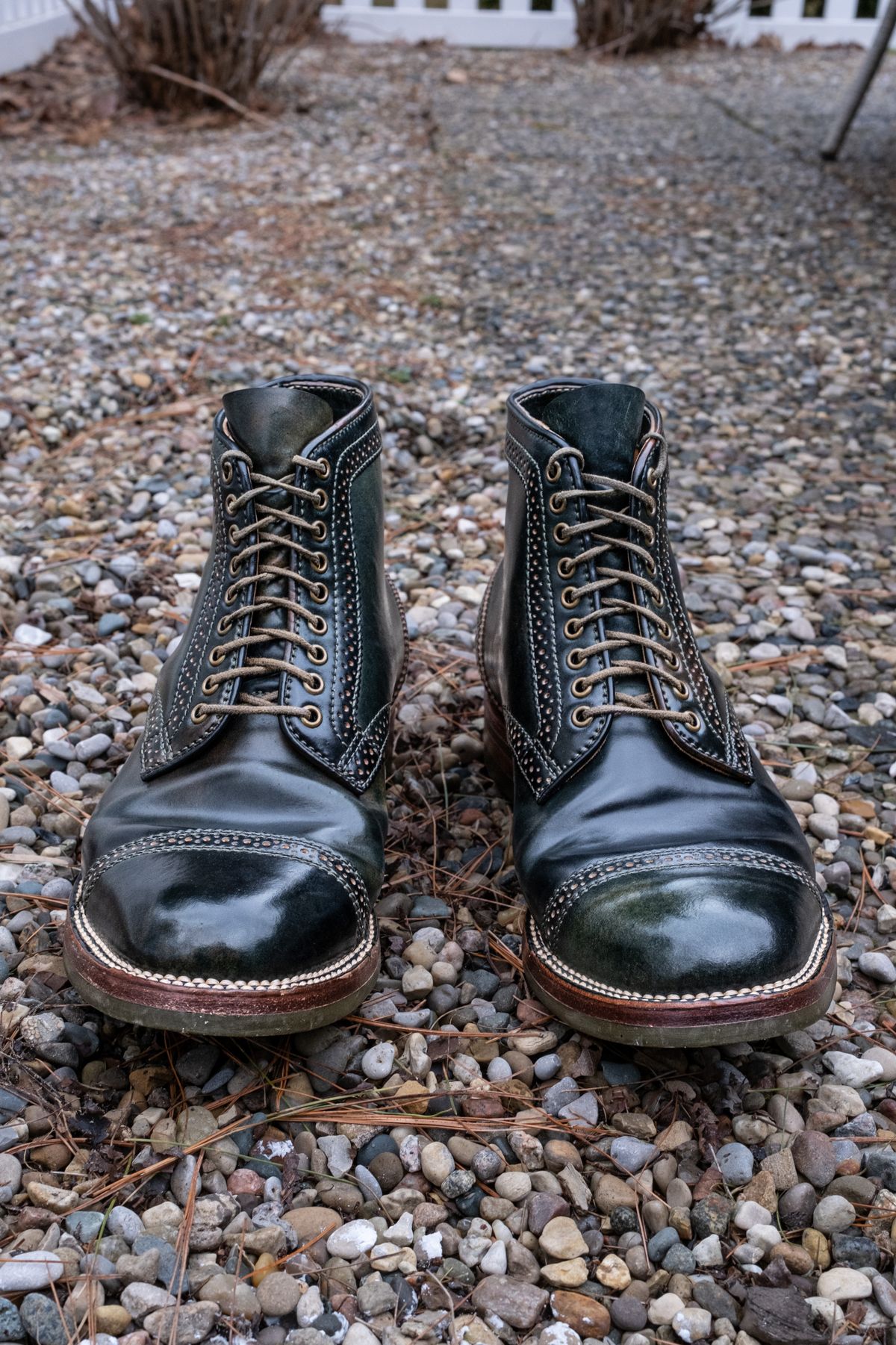 Photo by weathered.hide on April 5, 2023 of the Flame Panda Brogue Cap Toe Service Boot in Horween Marbled Black Shell Cordovan.