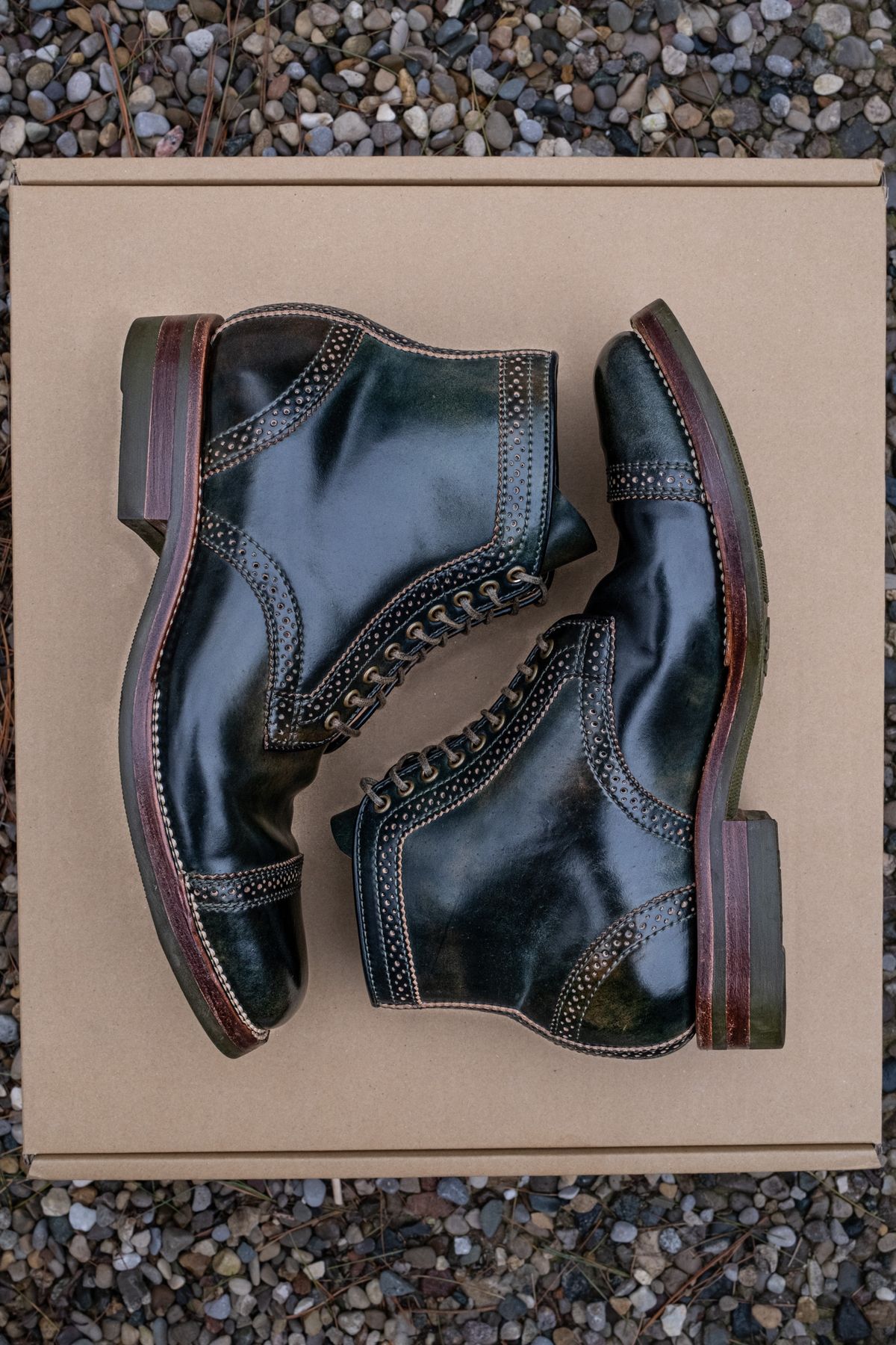 Photo by weathered.hide on April 5, 2023 of the Flame Panda Brogue Cap Toe Service Boot in Horween Marbled Black Shell Cordovan.