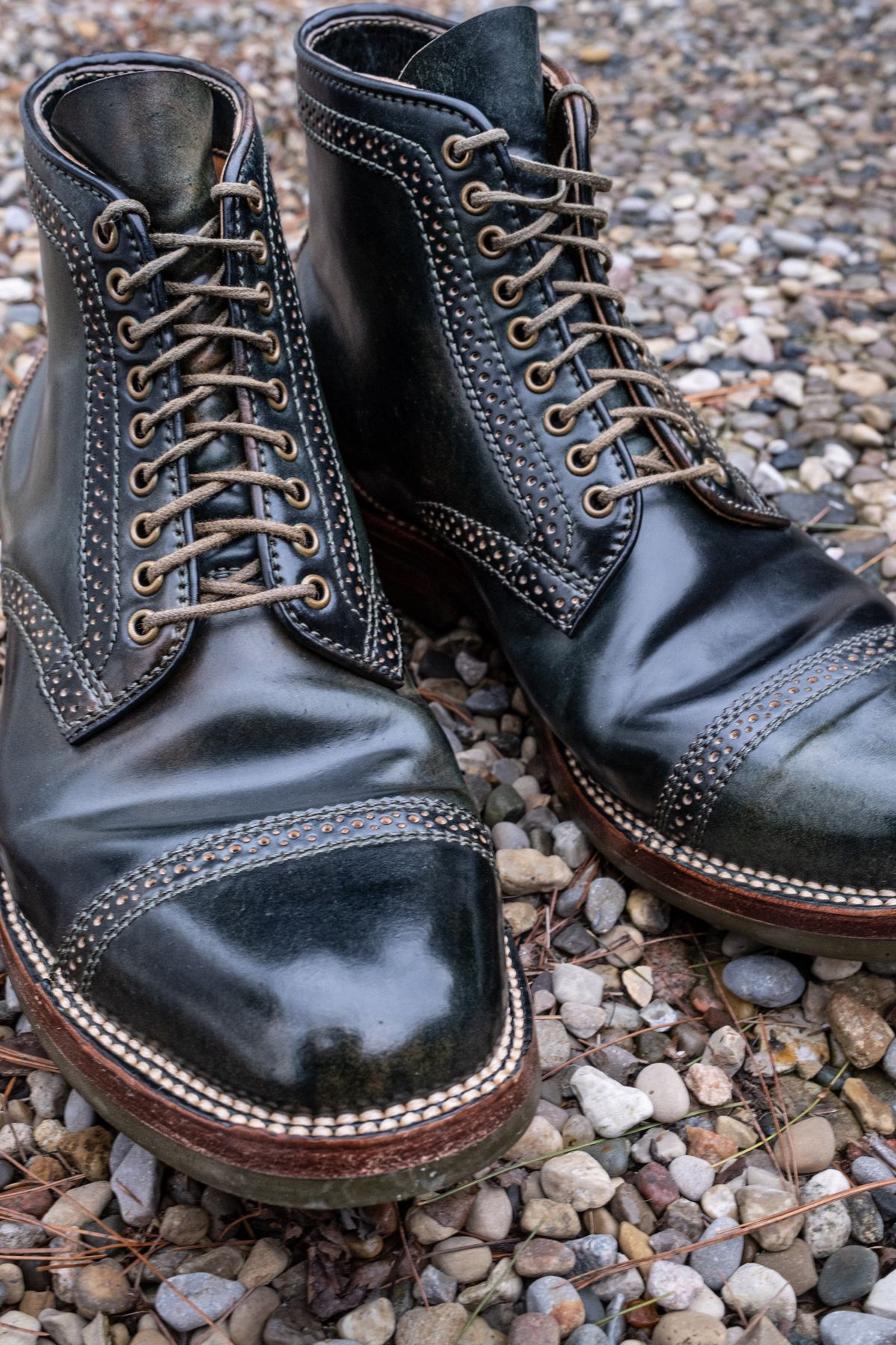 Photo by weathered.hide on April 6, 2023 of the Flame Panda Brogue Cap Toe Service Boot in Horween Marbled Black Shell Cordovan.