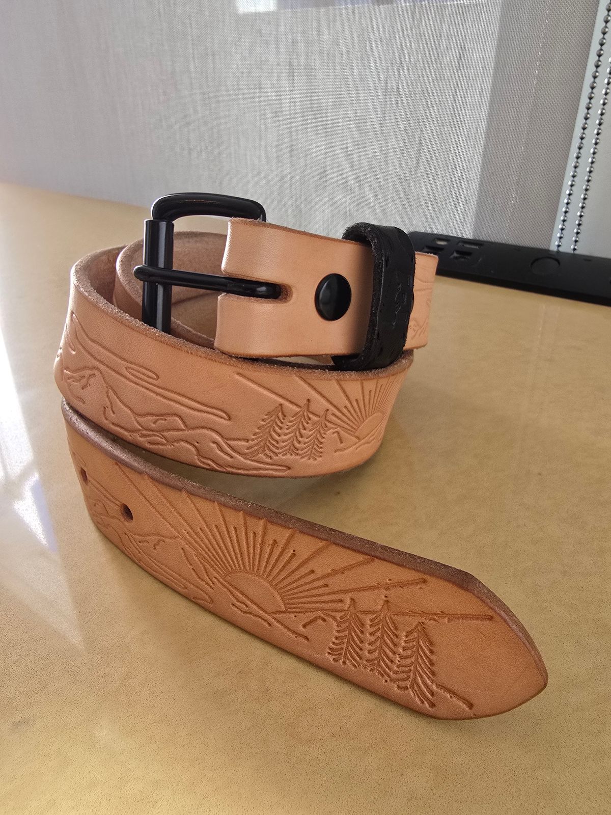 Photo by LouisvilleLeatherGuy on December 5, 2025 of the Ewing Dry Goods "Stamped Series" Minimalist Belt in Wickett & Craig Natural Veg Tan.