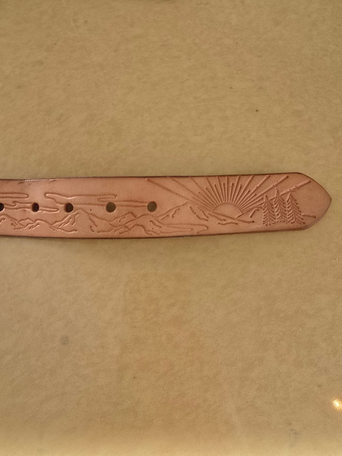 Photo by LouisvilleLeatherGuy on December 5, 2025 of the Ewing Dry Goods "Stamped Series" Minimalist Belt in Wickett & Craig Natural Veg Tan.