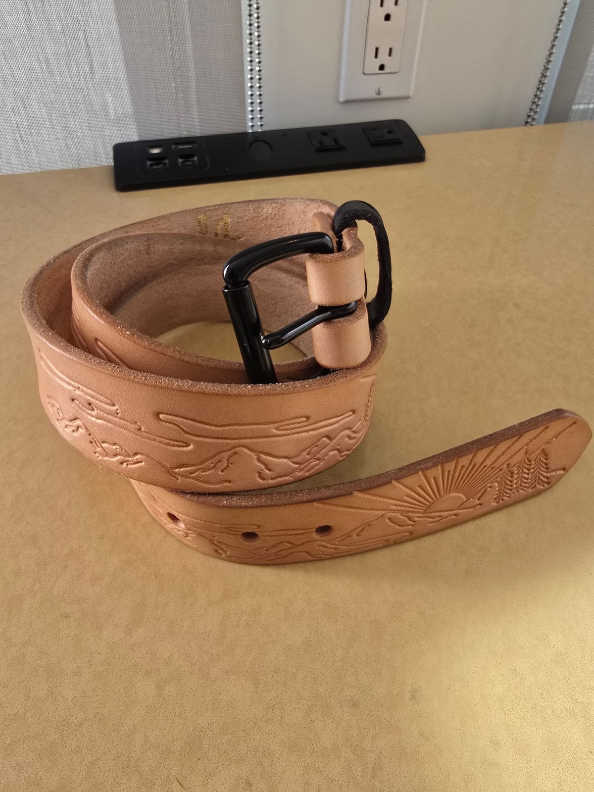 Photo by LouisvilleLeatherGuy on December 5, 2025 of the Ewing Dry Goods "Stamped Series" Minimalist Belt in Wickett & Craig Natural Veg Tan.