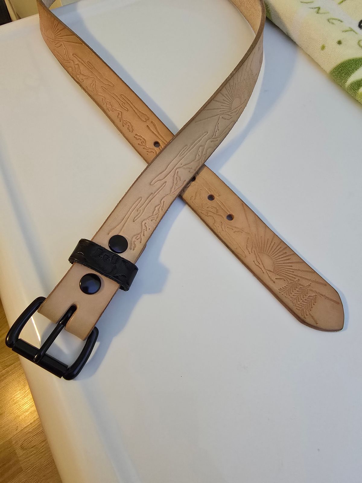 Photo by LouisvilleLeatherGuy on January 5, 2026 of the Ewing Dry Goods "Stamped Series" Minimalist Belt in Wickett & Craig Natural Veg Tan.