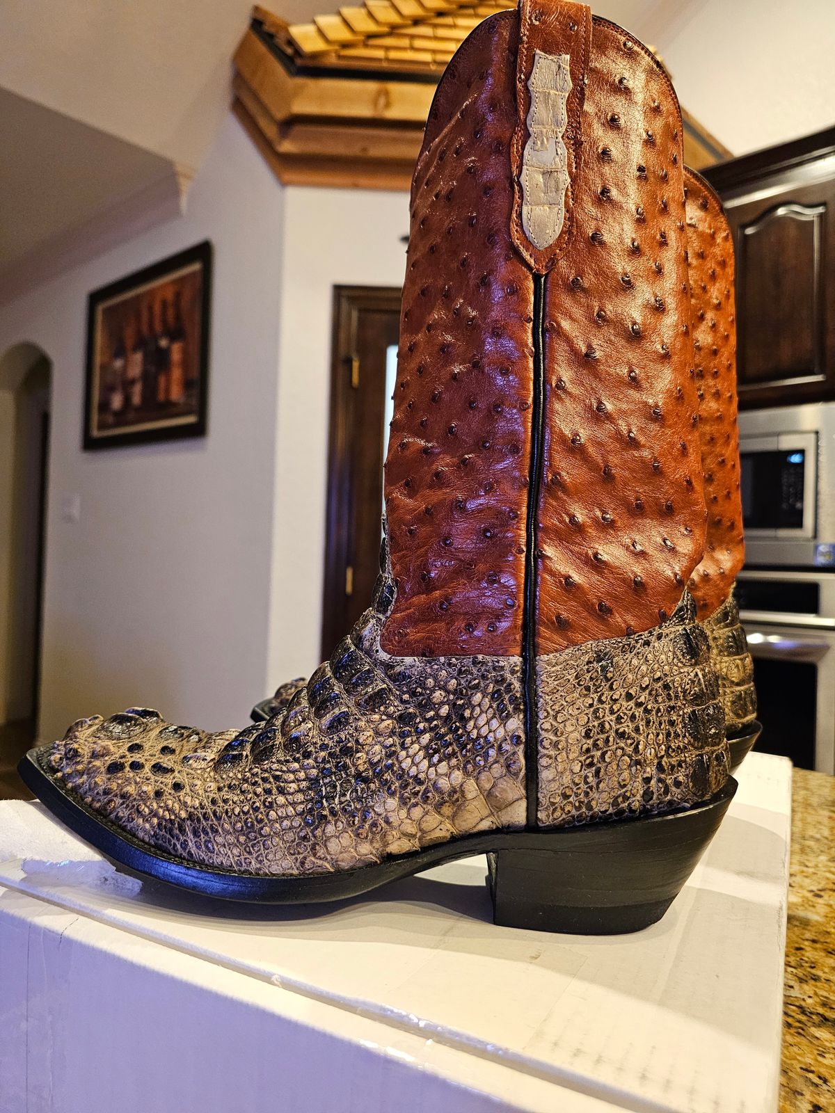Photo by arriaga214 on April 20, 2024 of the Acosta Boots. Cowboy Boot in Head Cut Gator, Full Quill Ostrich.