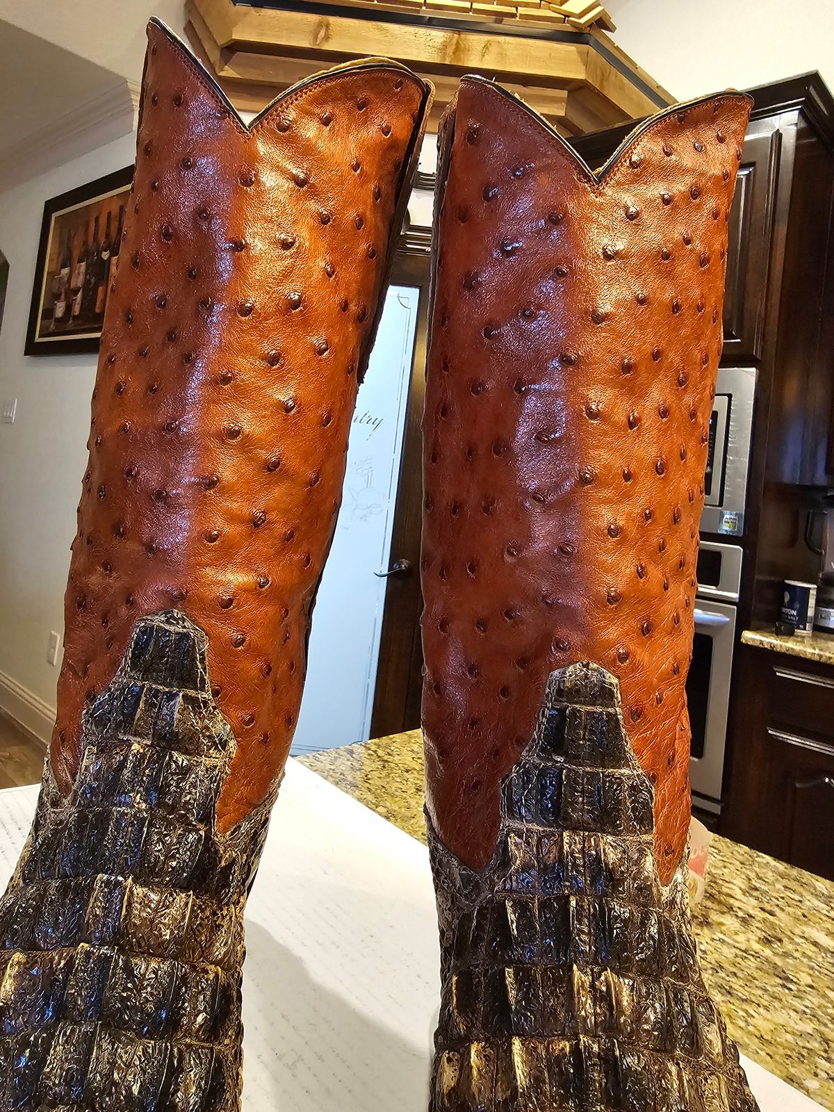 Photo by arriaga214 on April 20, 2024 of the Acosta Boots. Cowboy Boot in Head Cut Gator, Full Quill Ostrich.