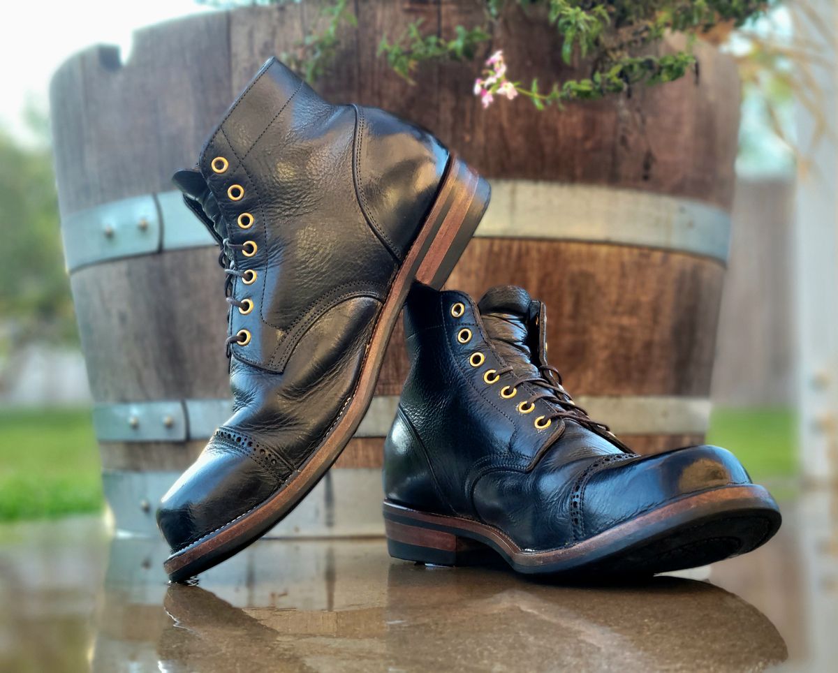 Photo by Arsenicmickey on April 3, 2024 of the Iron Boots Pitman in Black Italy Waxed Bullhide.
