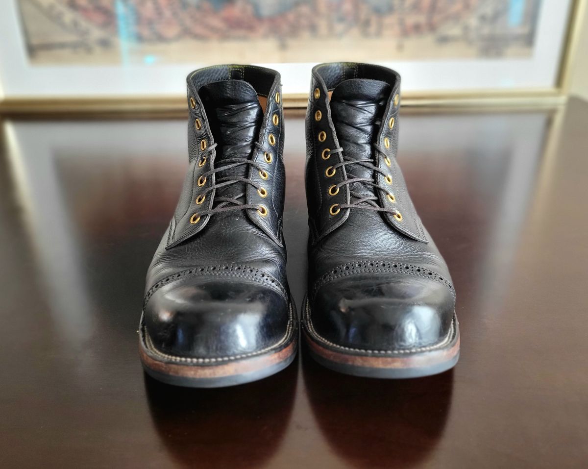 Photo by Arsenicmickey on April 3, 2024 of the Iron Boots Pitman in Black Italy Waxed Bullhide.