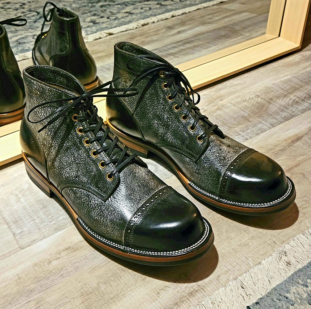 Photo by Arsenicmickey on February 15, 2023 of the Iron Boots Pitman in Black Italy Waxed Bullhide.