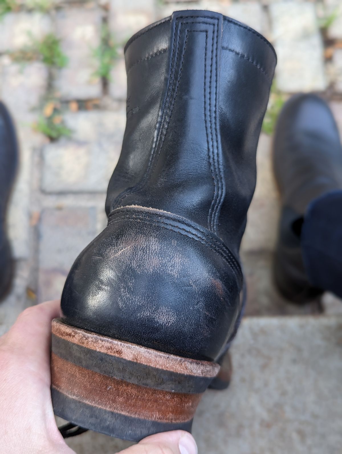Photo by demo on July 11, 2023 of the White's Bounty Hunter in Horween Black Chromexcel.