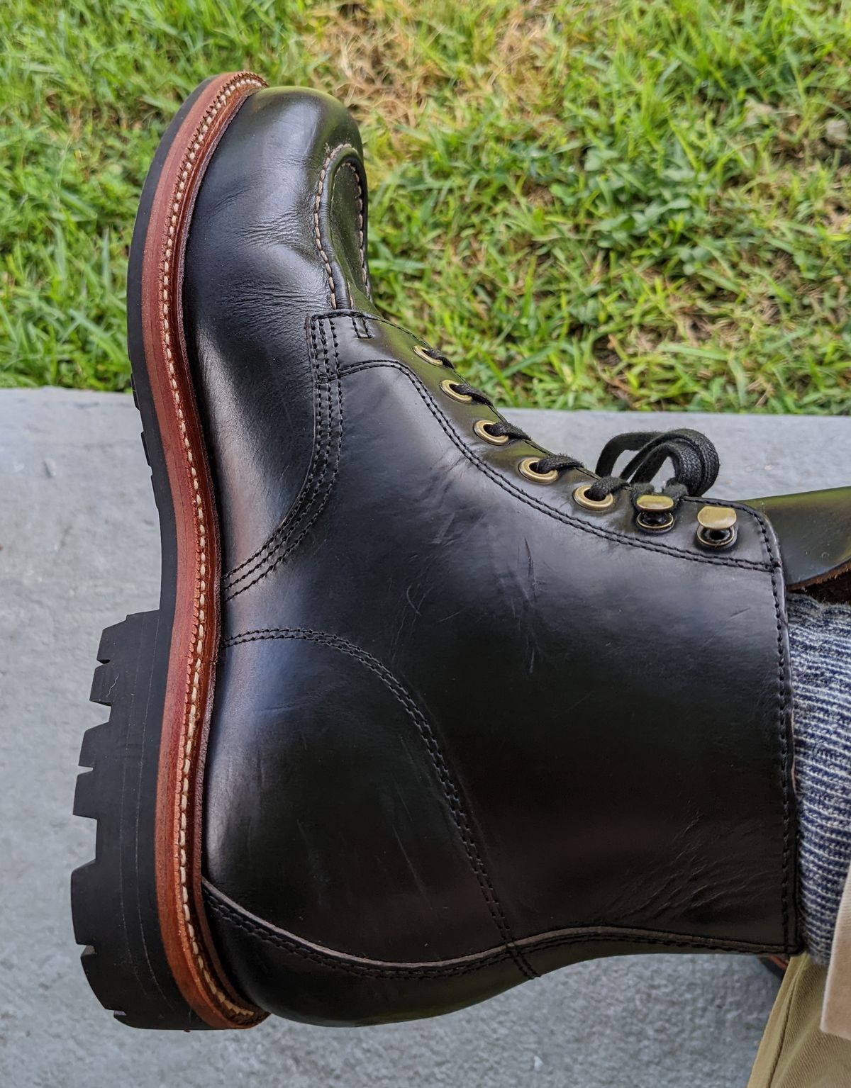 Photo by gonzalezebra on September 14, 2022 of the Grant Stone Brass Boot in Horween Black Chromexcel.