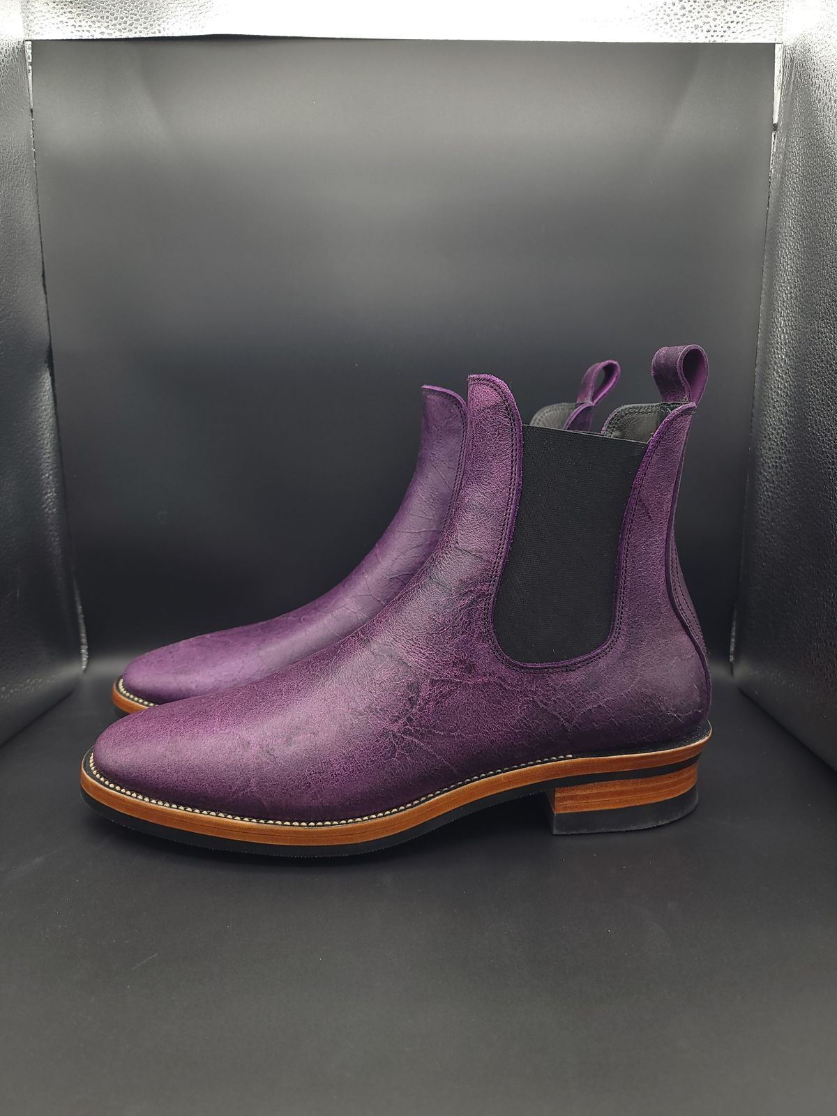 Photo by jinn35 on October 10, 2023 of the Fortis Boots El Primero in C.F. Stead Crazy Cow Royal Purple.