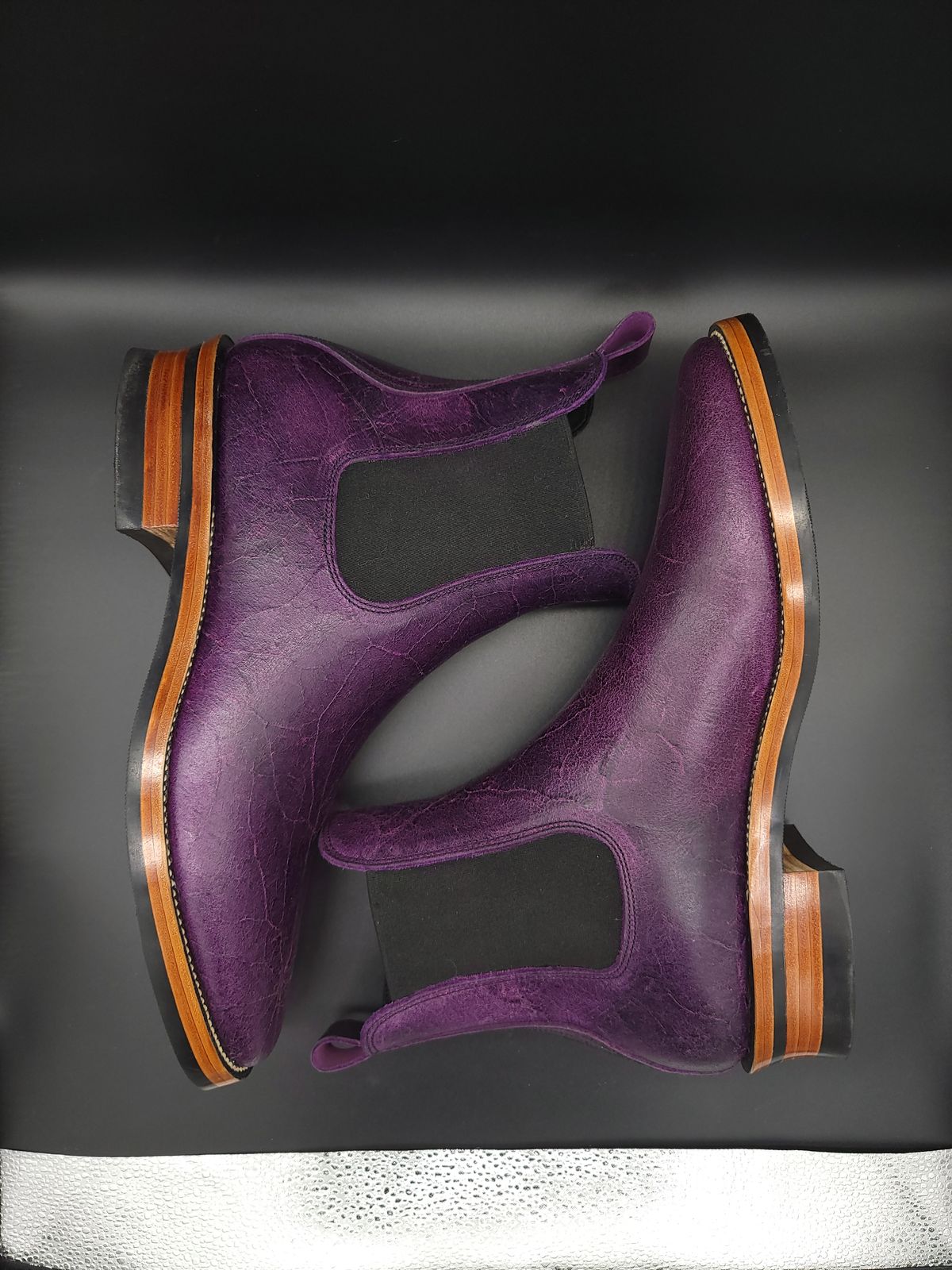 Photo by jinn35 on October 10, 2023 of the Fortis Boots El Primero in C.F. Stead Crazy Cow Royal Purple.