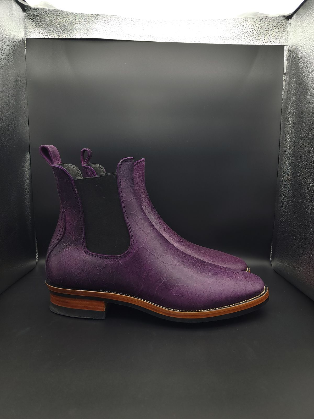 Photo by jinn35 on October 10, 2023 of the Fortis Boots El Primero in C.F. Stead Crazy Cow Royal Purple.
