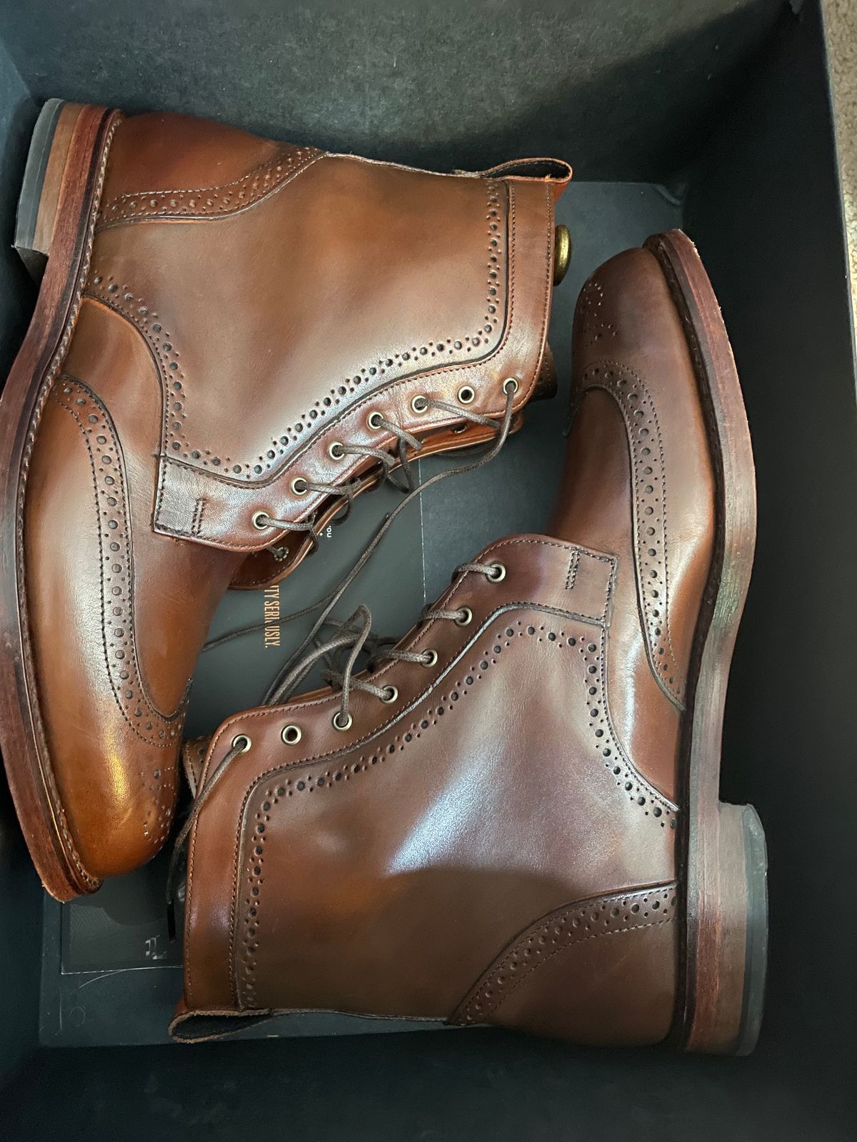Photo by bourbonandboots on October 6, 2023 of the Allen Edmonds Dalton Wingtip Dress Boot in Dark Chili Calfskin.