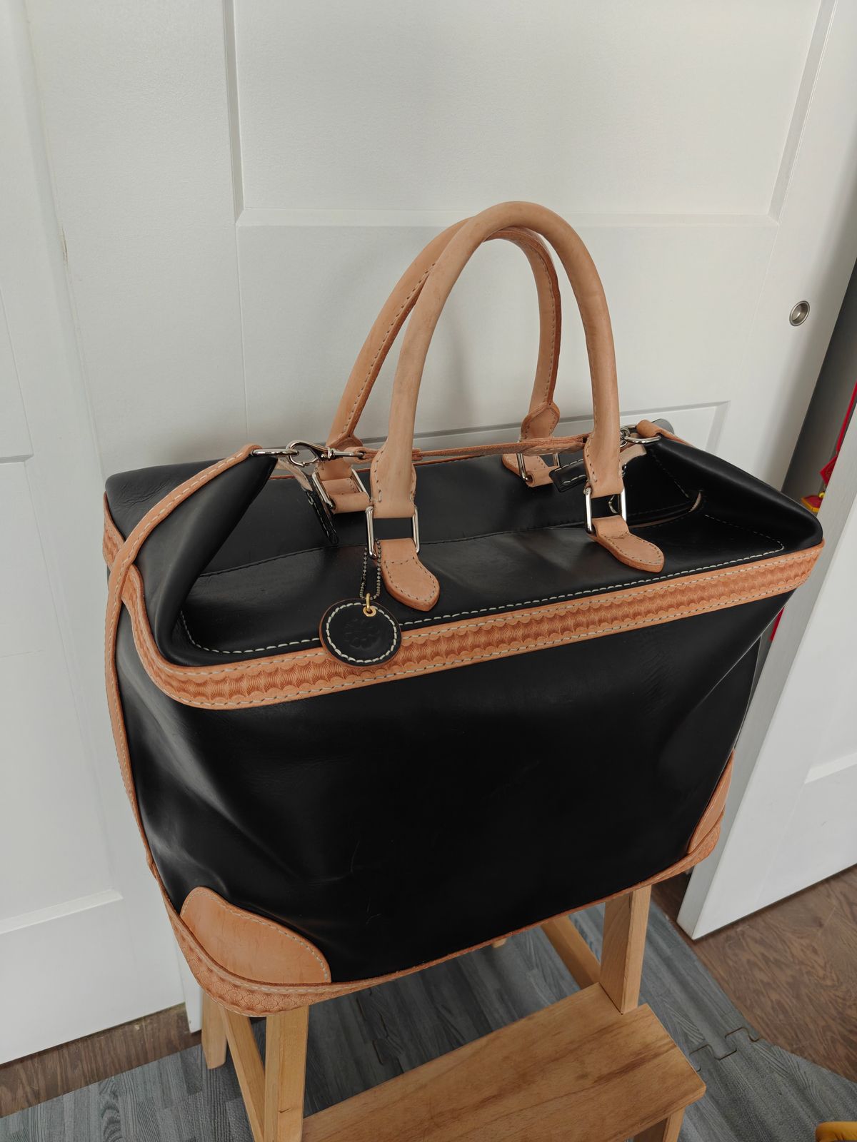 Photo by litespeedd on August 13, 2025 of the Black Lotus Leather Travel Bag in Weaver Natural Vegetable Tan Shoulder & La Bretagna Cowboy Black.