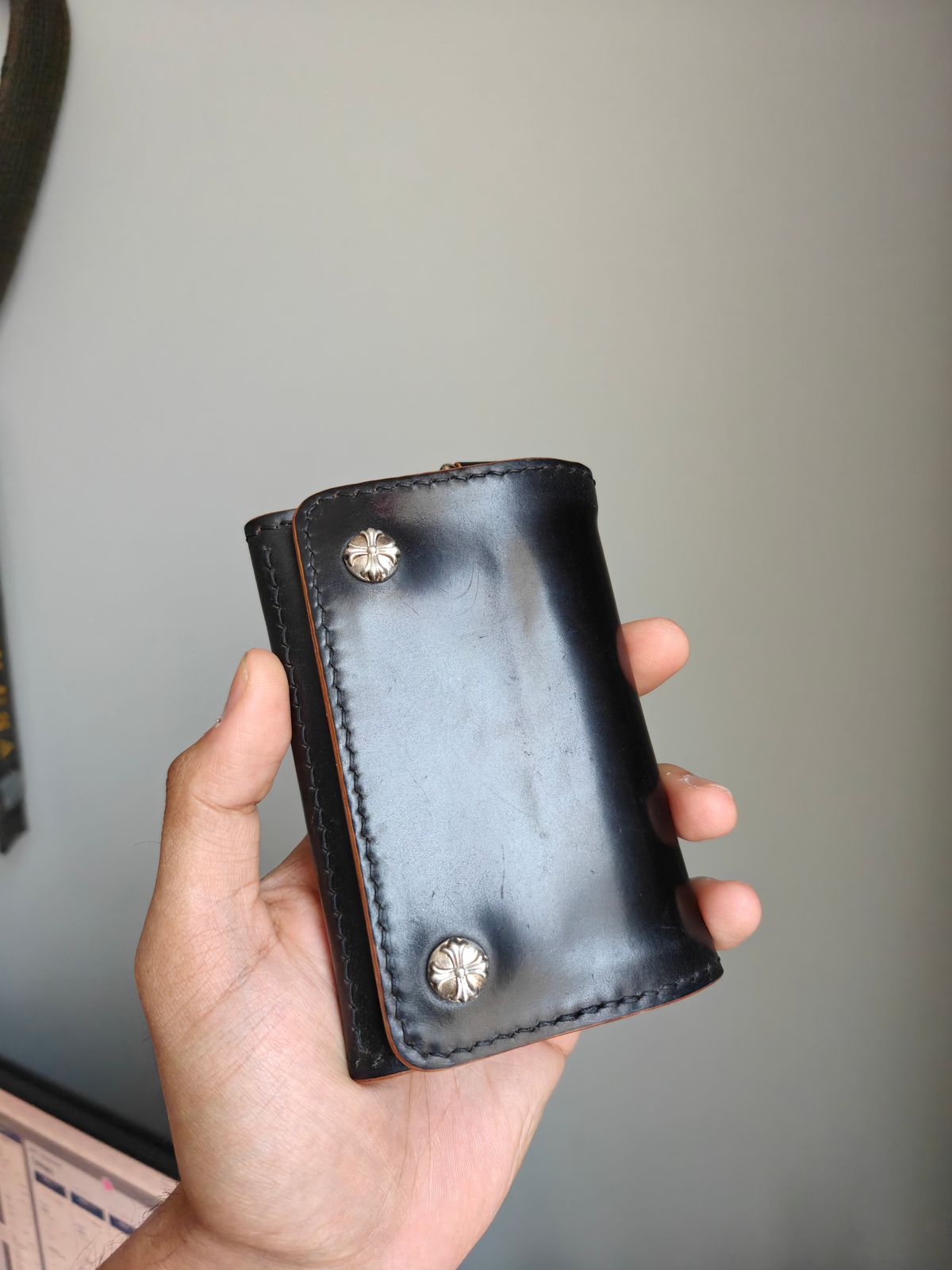 Photo by litespeedd on August 11, 2025 of the Black Lotus Leather Custom Tracker Wallet in Rocado Black Shell Cordovan.