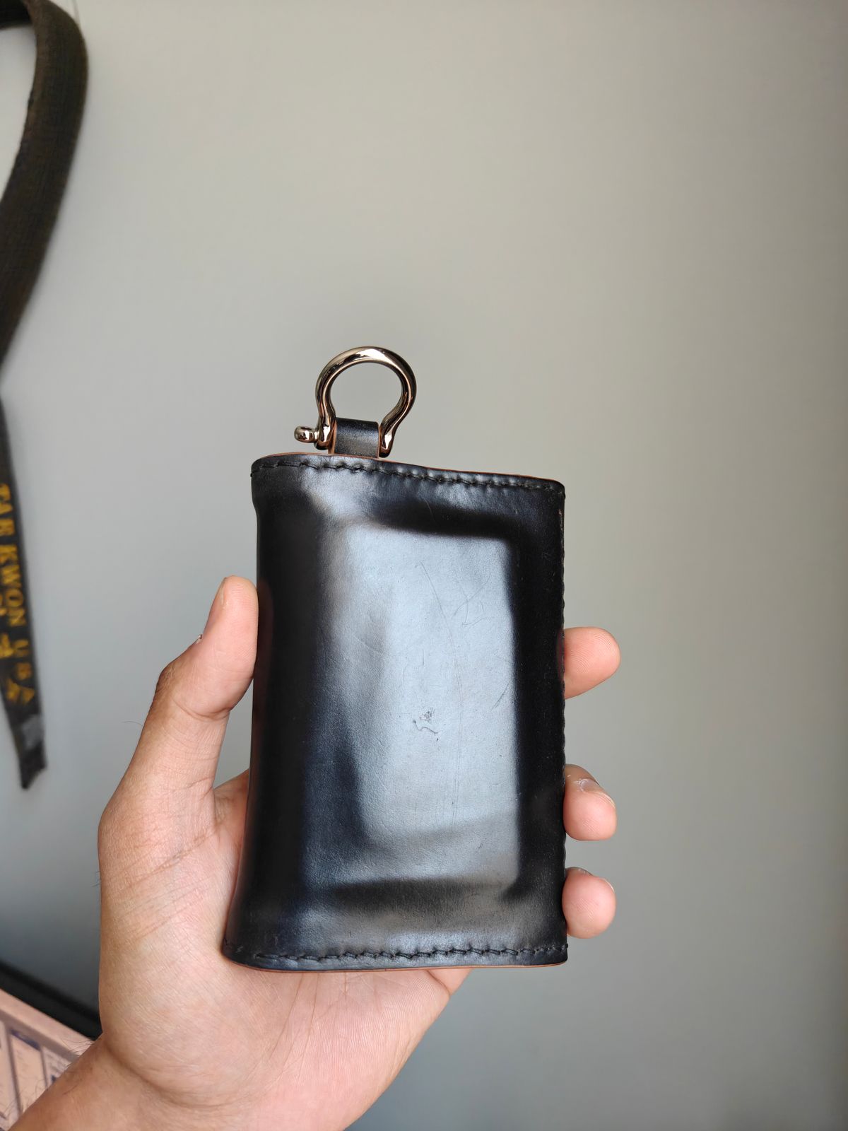 Photo by litespeedd on August 11, 2025 of the Black Lotus Leather Custom Tracker Wallet in Rocado Black Shell Cordovan.