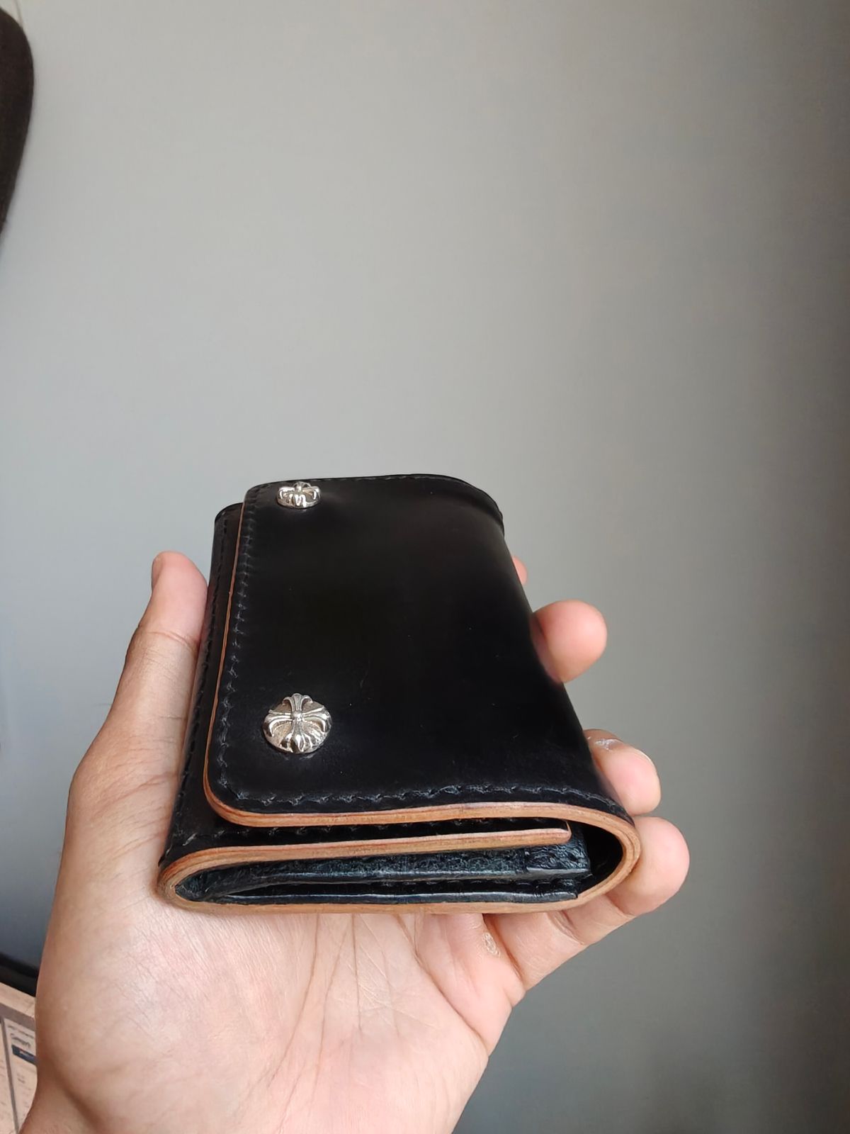 Photo by litespeedd on August 11, 2025 of the Black Lotus Leather Custom Tracker Wallet in Rocado Black Shell Cordovan.