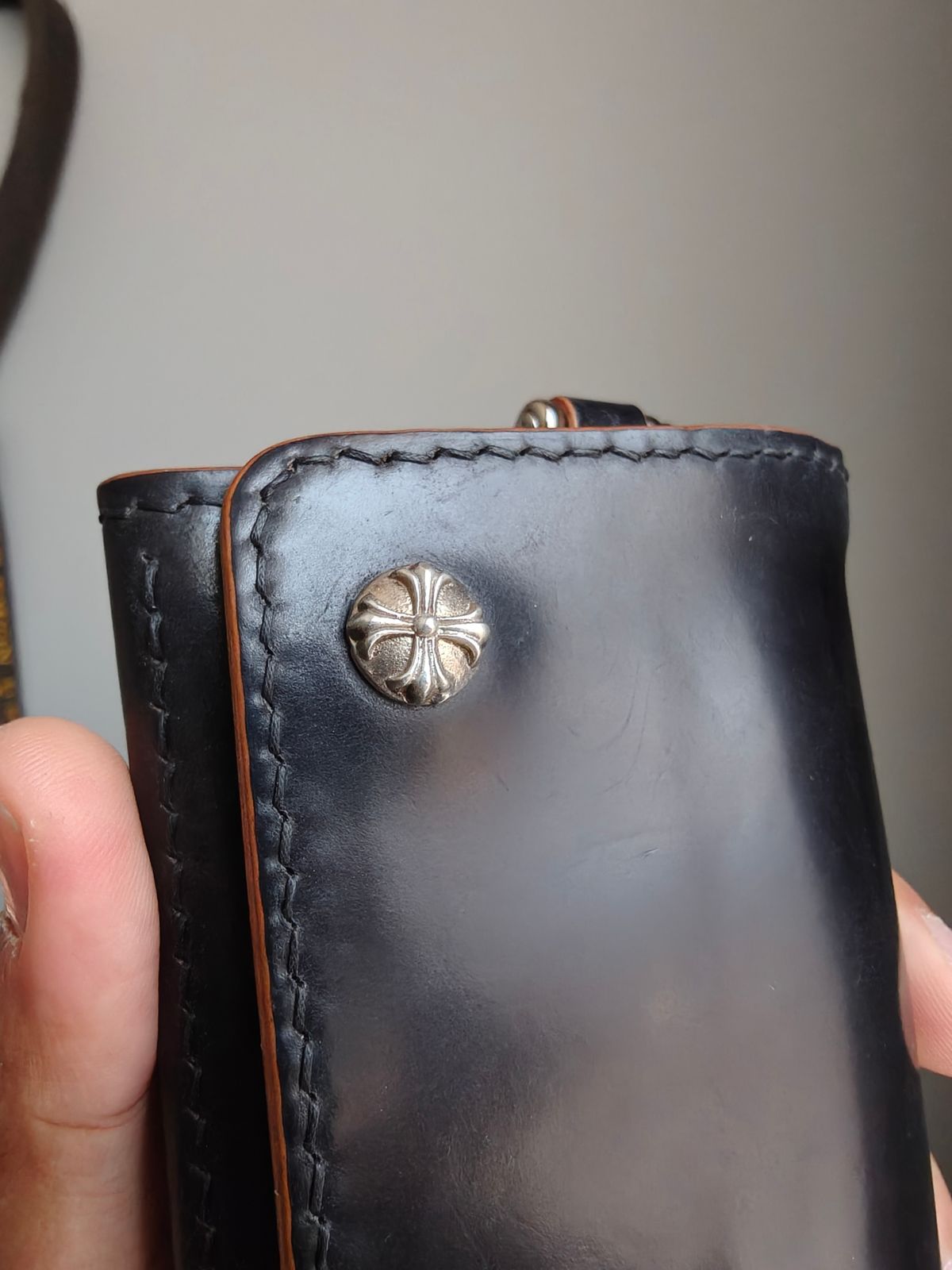 Photo by litespeedd on August 11, 2025 of the Black Lotus Leather Custom Tracker Wallet in Rocado Black Shell Cordovan.