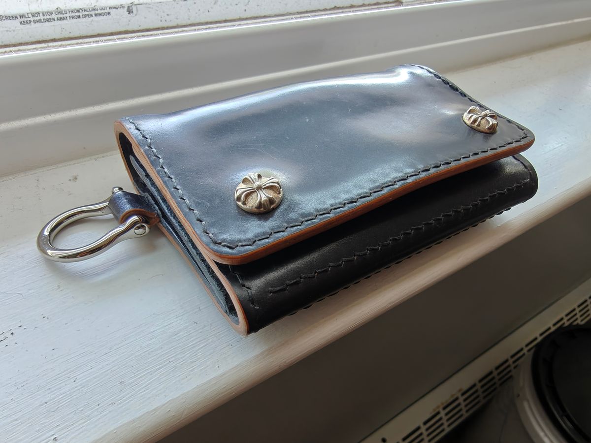 Photo by litespeedd on August 13, 2025 of the Black Lotus Leather Custom Tracker Wallet in Rocado Black Shell Cordovan.