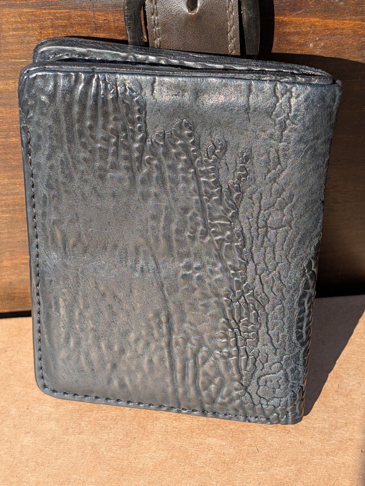 Photo by HealthyPatina on December 5, 2025 of the Ashland Leather Tall Fat Herbie in One-Off Horween Aspen Horsebutt (with shell intact) in Black.