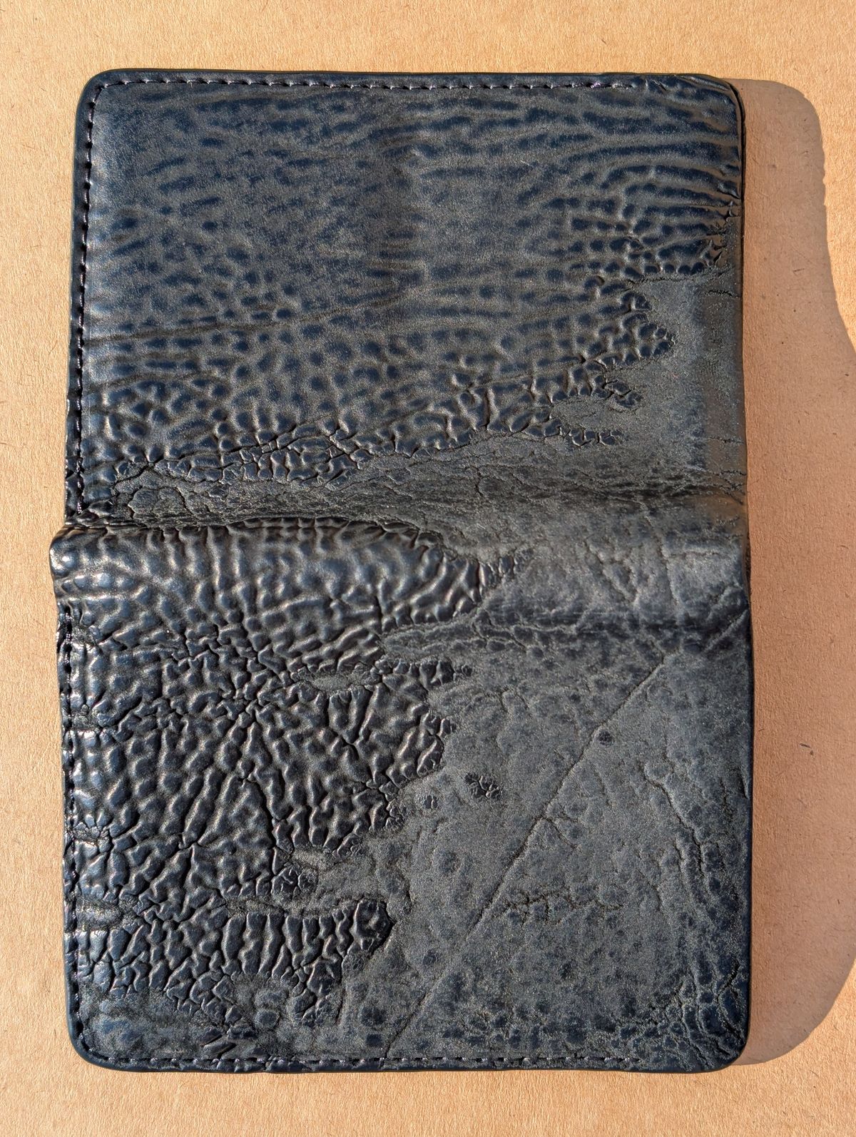 Photo by HealthyPatina on December 5, 2025 of the Ashland Leather Tall Fat Herbie in One-Off Horween Aspen Horsebutt (with shell intact) in Black.