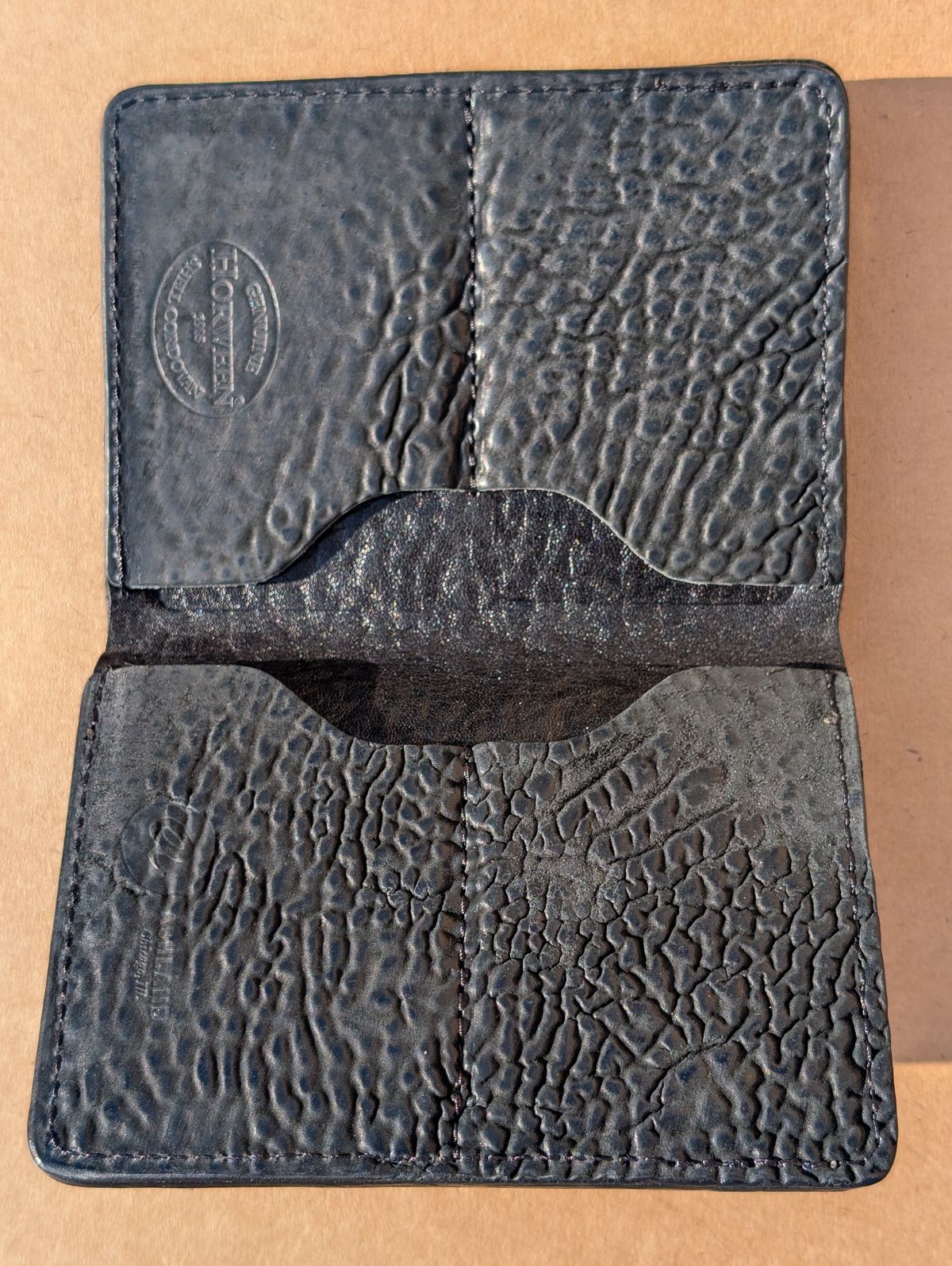 Photo by HealthyPatina on December 5, 2025 of the Ashland Leather Tall Fat Herbie in One-Off Horween Aspen Horsebutt (with shell intact) in Black.