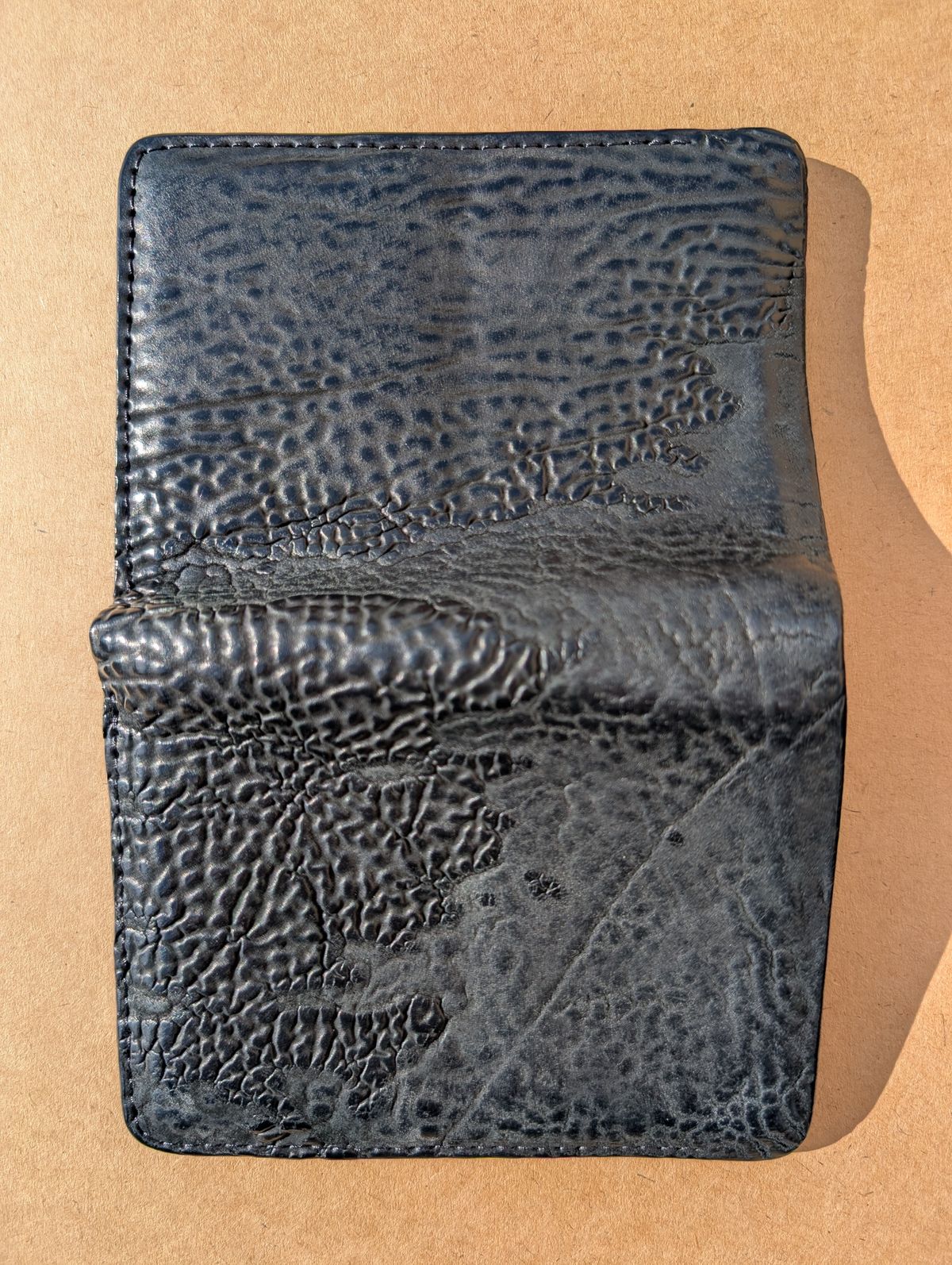 Photo by HealthyPatina on January 5, 2026 of the Ashland Leather Tall Fat Herbie in One-Off Horween Aspen Horsebutt (with shell intact) in Black.