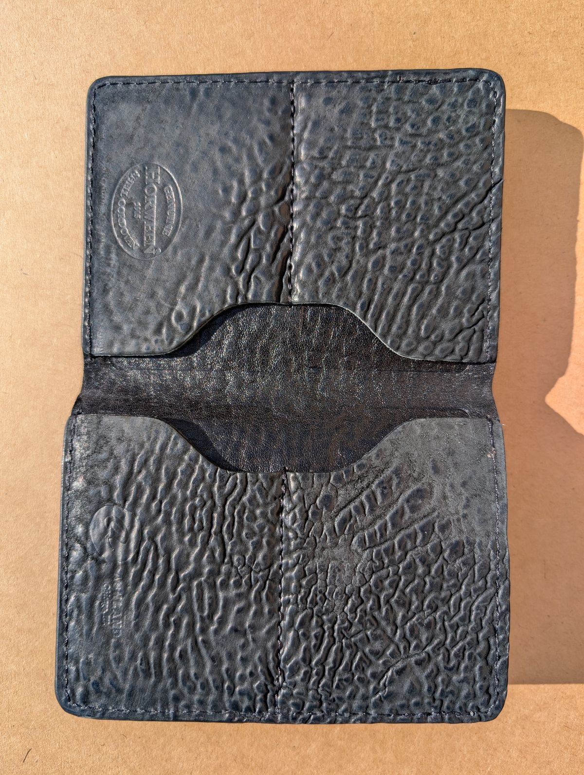 Photo by HealthyPatina on January 5, 2026 of the Ashland Leather Tall Fat Herbie in One-Off Horween Aspen Horsebutt (with shell intact) in Black.