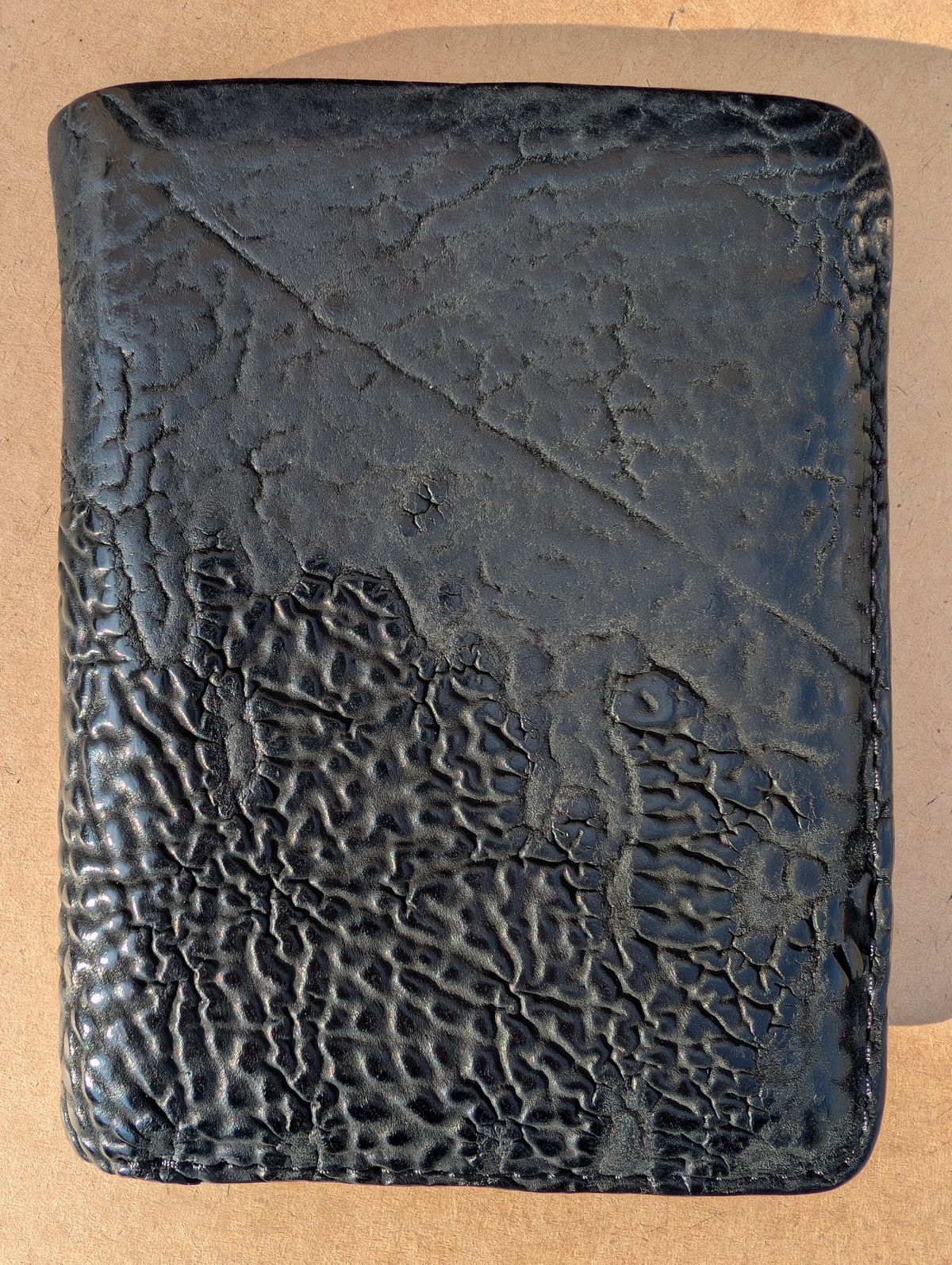 Photo by HealthyPatina on March 2, 2026 of the Ashland Leather Tall Fat Herbie in One-Off Horween Aspen Horsebutt (with shell intact) in Black.