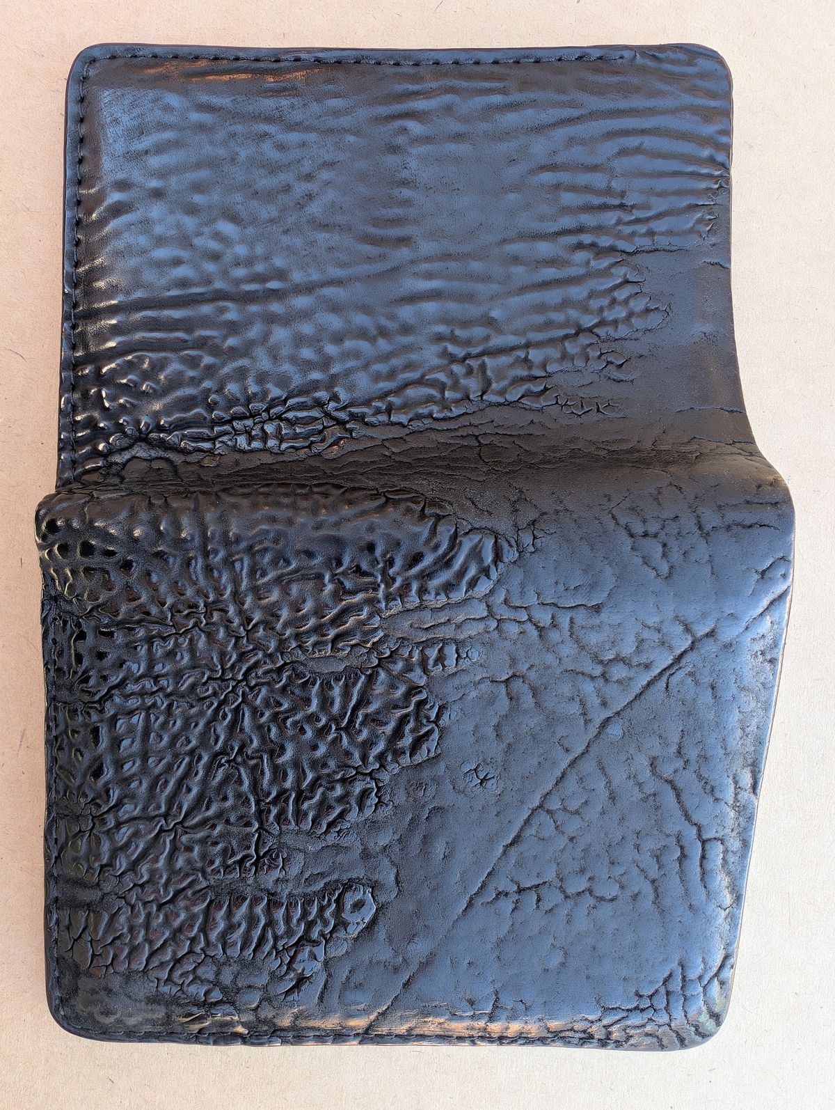 Photo by HealthyPatina on April 5, 2026 of the Ashland Leather Tall Fat Herbie in One-Off Horween Aspen Horsebutt (with shell intact) in Black.