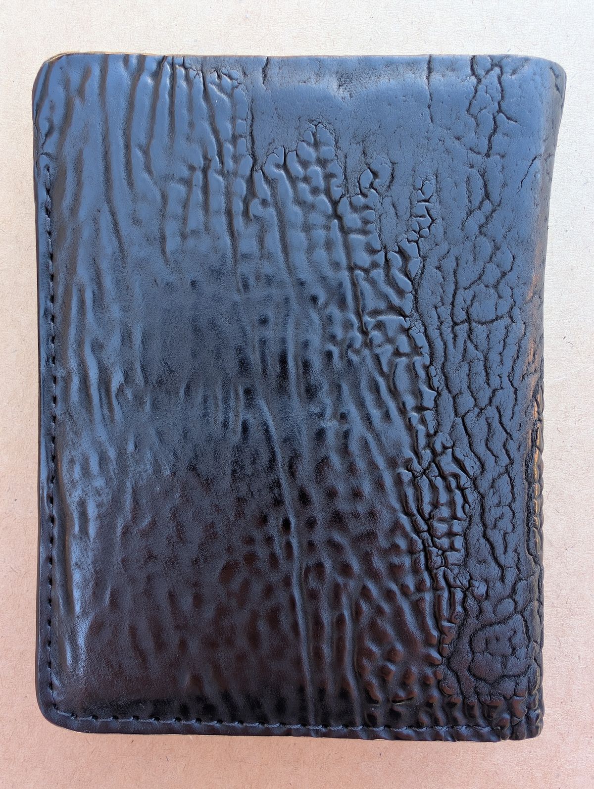 Photo by HealthyPatina on April 5, 2026 of the Ashland Leather Tall Fat Herbie in One-Off Horween Aspen Horsebutt (with shell intact) in Black.