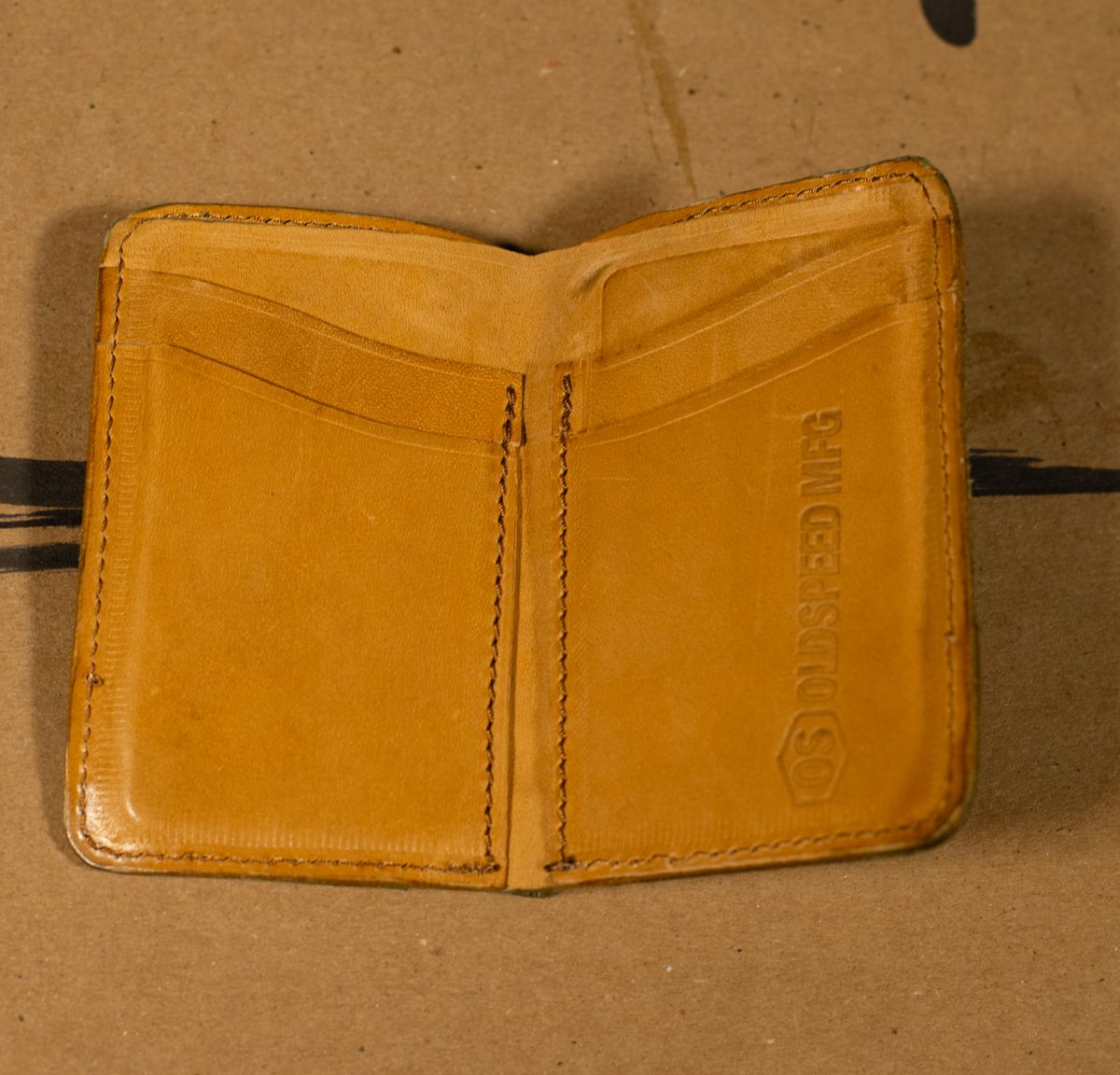 Photo by davecorey on December 4, 2025 of the Oldspeed MFG Western Wallet in Wickett & Craig Olive Traditional Harness.