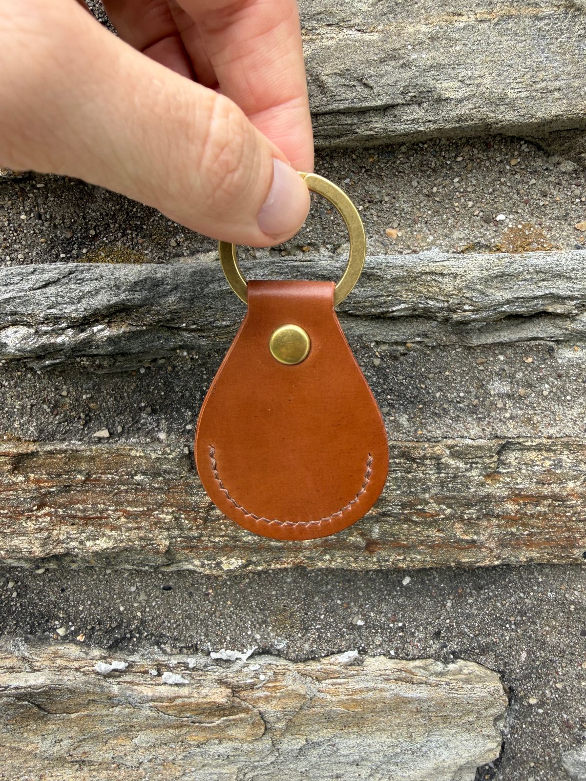 Photo by heroyjenkins on September 30, 2025 of the Titletown Goods Airtag Keychain in Horween Bourbon Shell Cordovan.