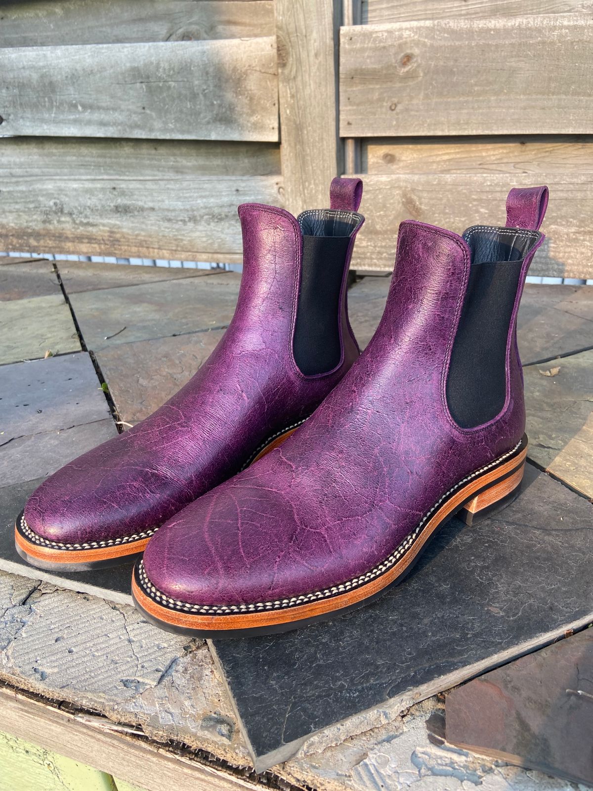 Photo by zanderrose on June 16, 2023 of the Fortis Boots Wholecut Chelsea in C.F. Stead Royal Purple Crazy Cow.