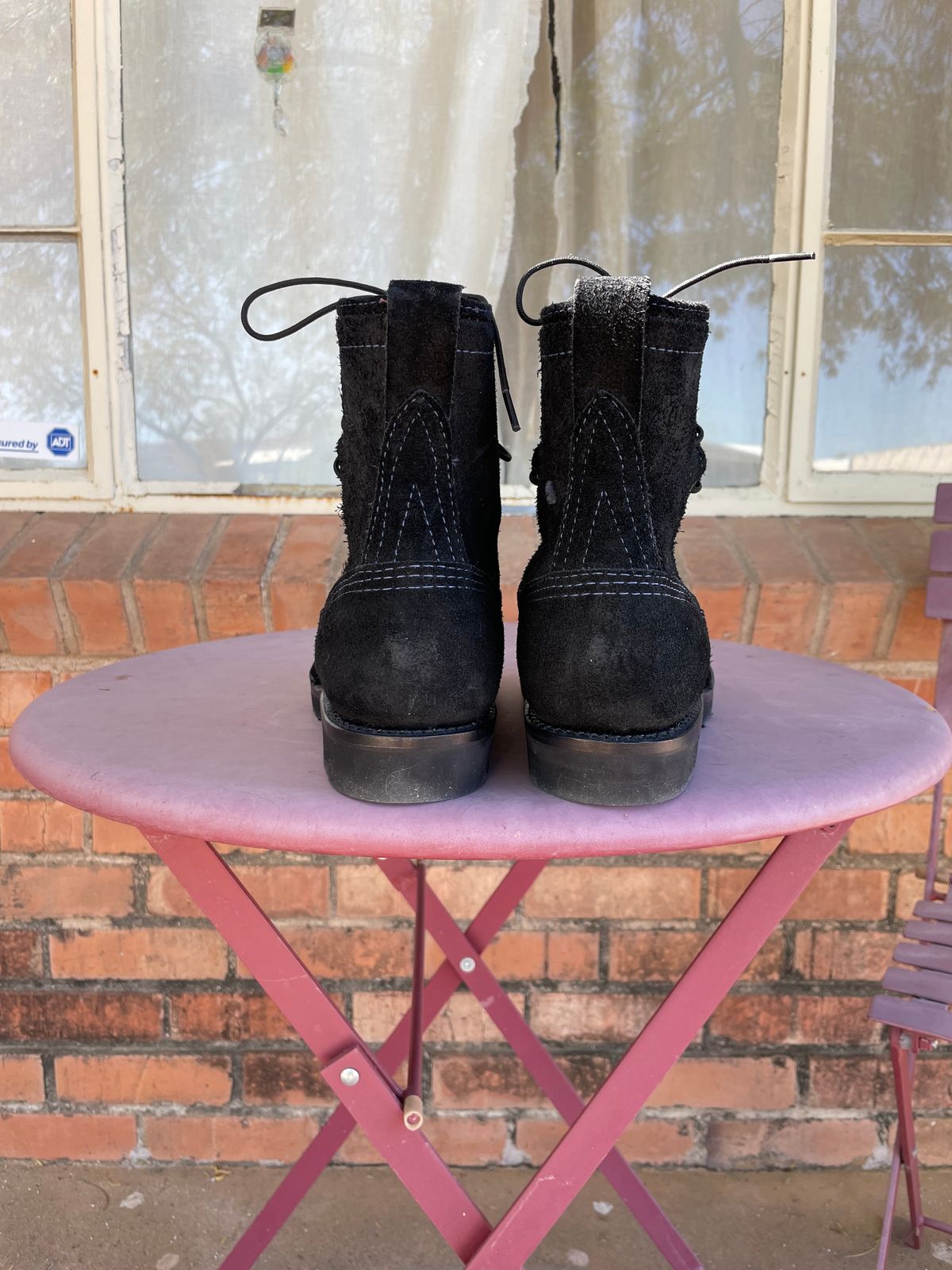 Photo by shakincheese on November 2, 2025 of the Wesco /x The Shop Black DH Service Boot in Seidel Black Oil Tan Roughout.