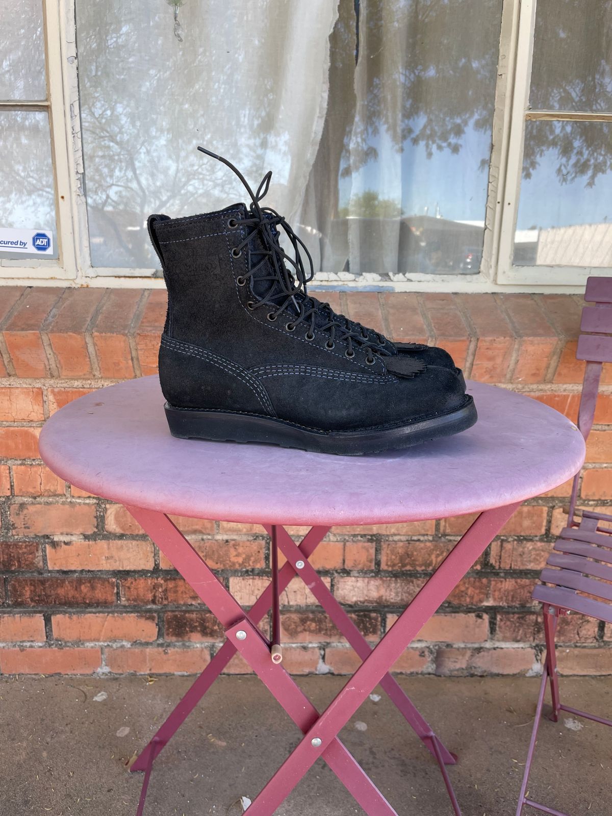Photo by shakincheese on November 2, 2025 of the Wesco /x The Shop Black DH Service Boot in Seidel Black Oil Tan Roughout.
