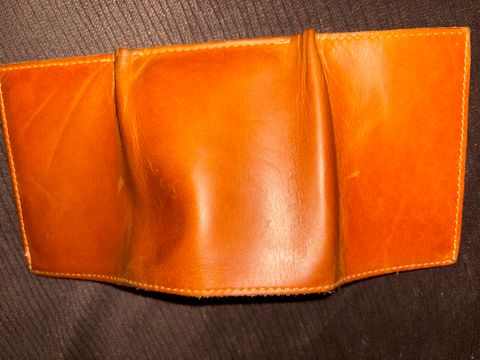 Photo by MuttBarker on December 5, 2025 of the Rodos Leather Crafts Camel Full Grain Leather Trifold Wallet in Tochigi Oil Vachetta #1 Light Brown.