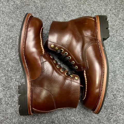 Photo by stinkypatina on October 12, 2025 of the Grant Stone Brass Boot in Horween Crimson Chromexcel.