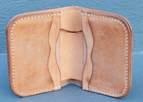 Photo by JewishJesus on December 3, 2025 of the Wild Frontier Goods Frontier Bifold Wallet in Kakishibu Hand Painted Shell Cordovan & Natural Buffed Cowhide.