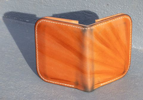 Photo by JewishJesus on January 1, 2026 of the Wild Frontier Goods Frontier Bifold Wallet in Kakishibu Hand Painted Shell Cordovan & Natural Buffed Cowhide.