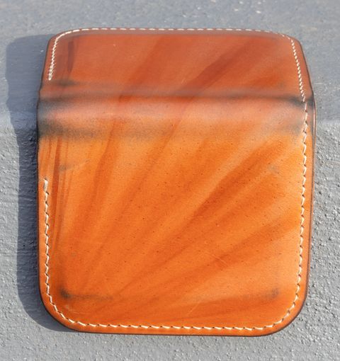 Photo by JewishJesus on January 1, 2026 of the Wild Frontier Goods Frontier Bifold Wallet in Kakishibu Hand Painted Shell Cordovan & Natural Buffed Cowhide.